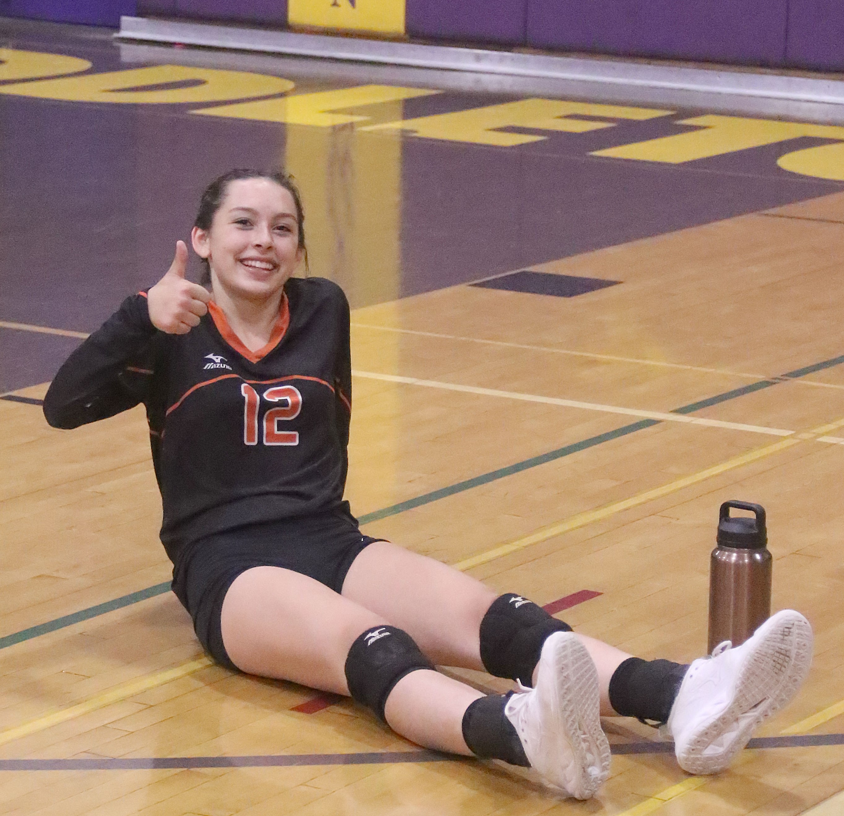 Kelseyville's Ashlyn Klein gives a thumbs up to the Knights' five-set win over Middletown. (Photos by Minenna Photography)