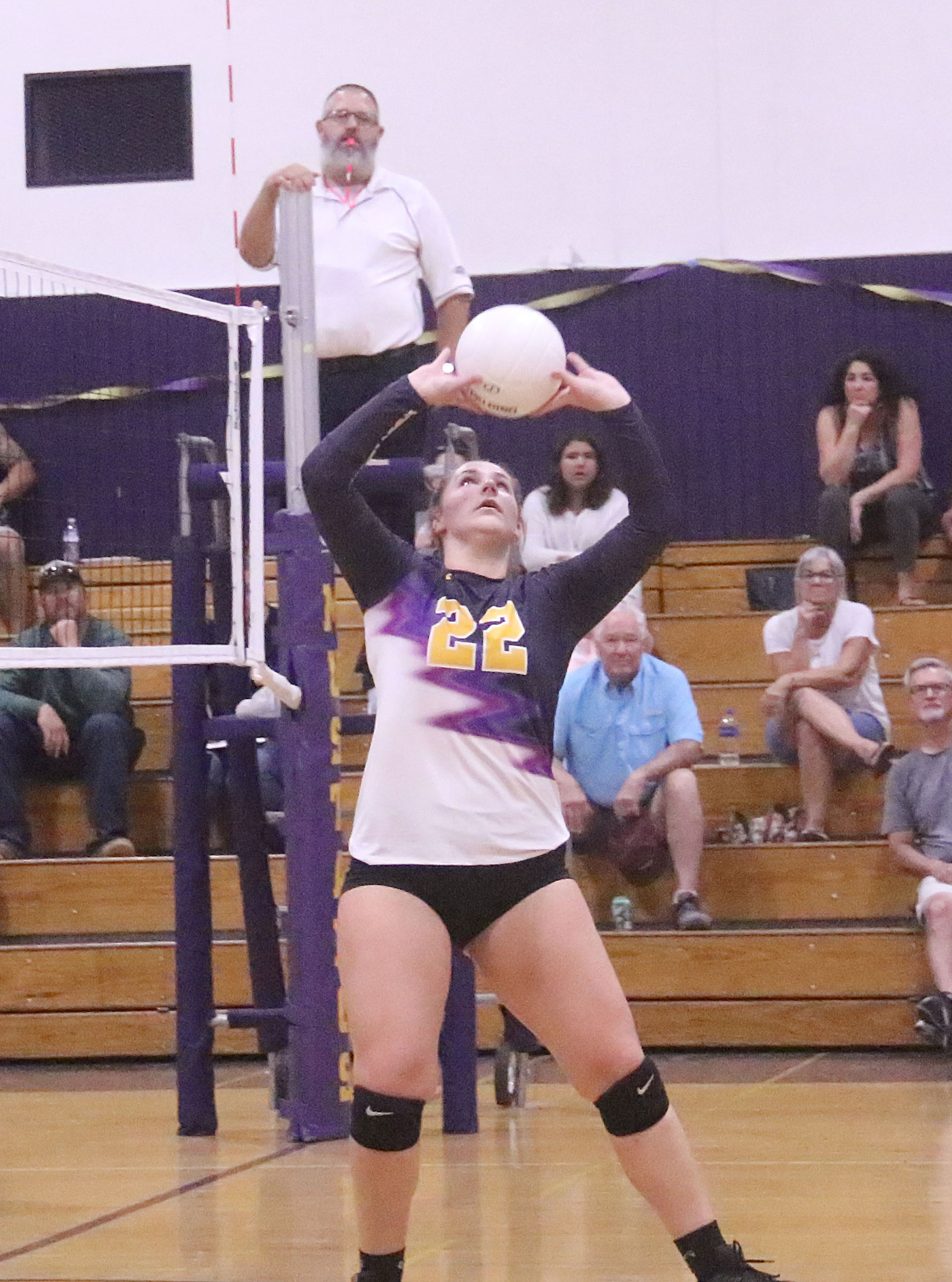 Ella Sust sets the ball for Middletown against Kelseyville. (Photos by Minenna Photography)