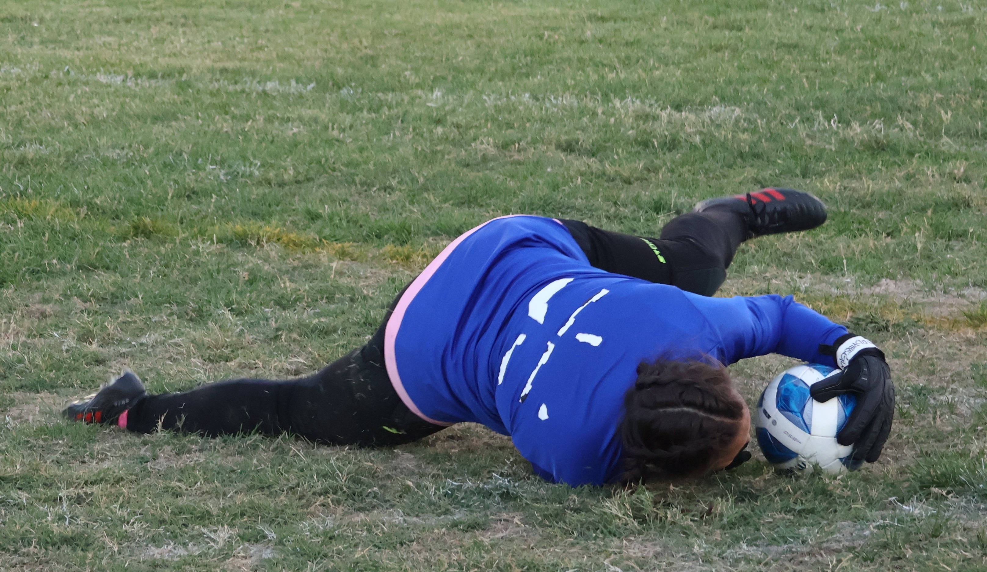 Middletown keeper Krystal Ocken corrals a shot on goal with a diving stop. (Photos by Brian Sumpter)