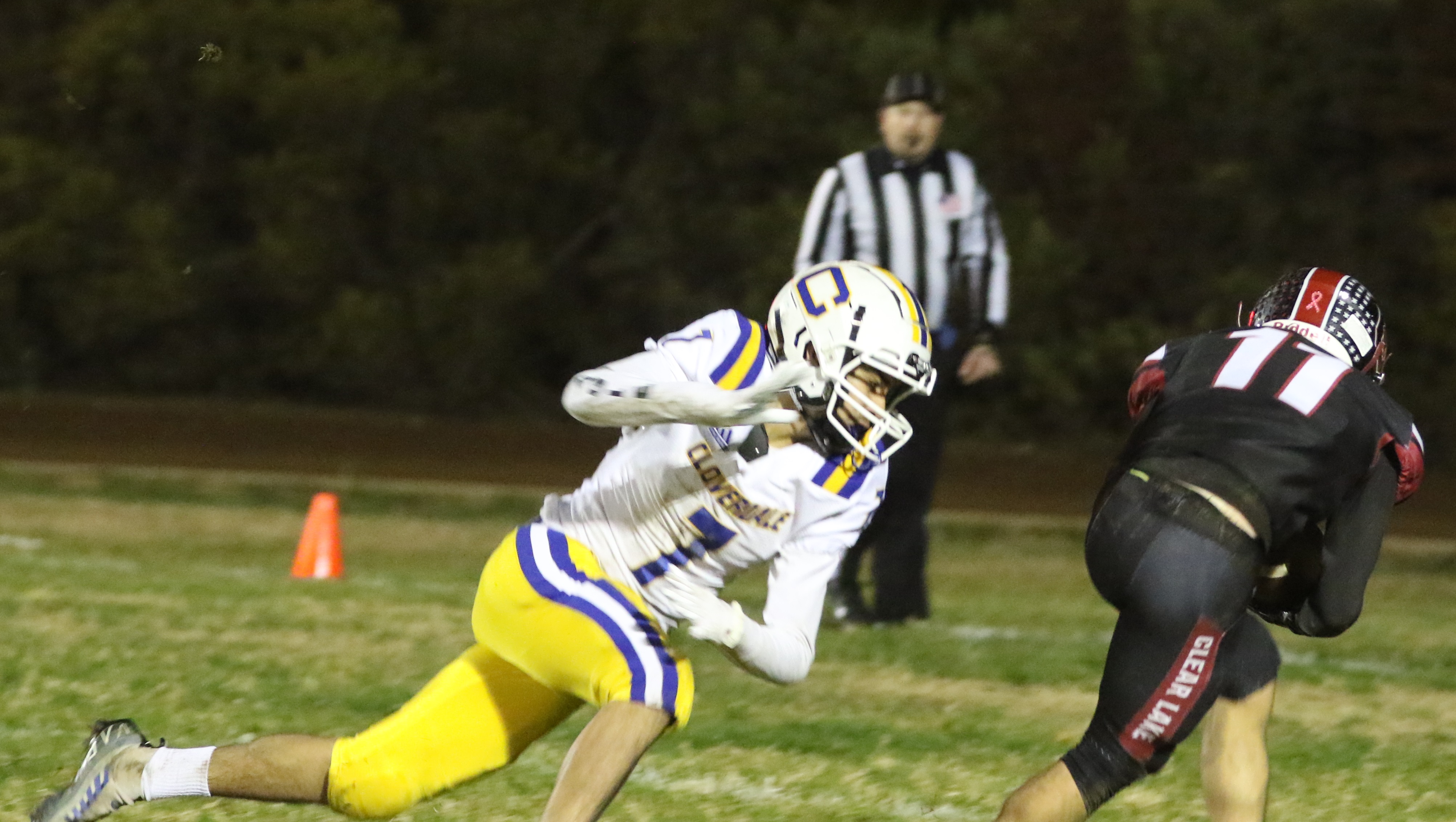 Clear Lake's Saul Reyes hauls in a pass from quarterback Jake Soderquist in the third quarter. Reyes' 17-yard catch and run for a touchdown gave the Cardinals 32-13 lead. (Photos by Minenna Photography)