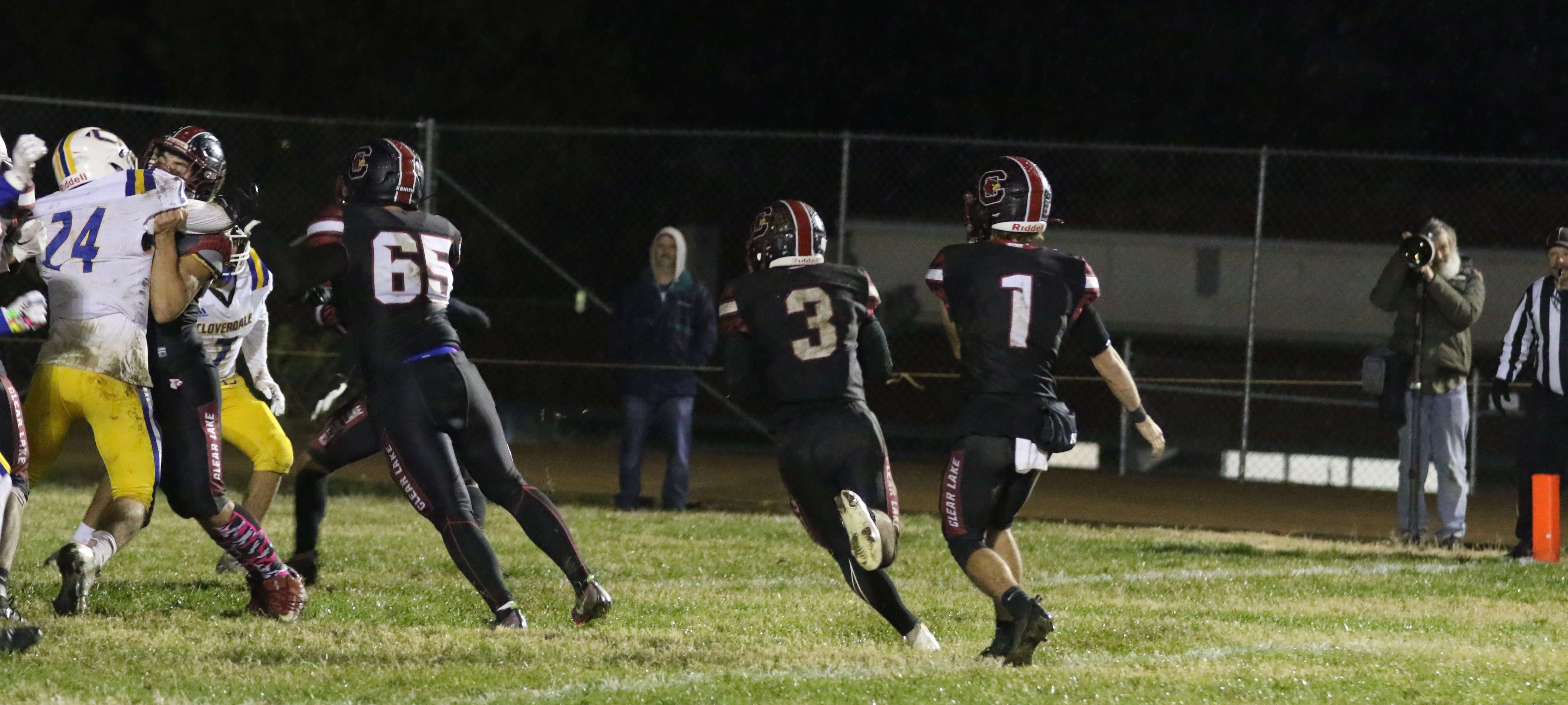 Clear Lake's Hank Ollenberger takes aim on the end zone for his second rushing score of the night and fourth touchdown overall in the fourth quarter of a 47-13 playoff win over Cloverdale on Friday night in Lakeport. (Photos by Minenna Photography)