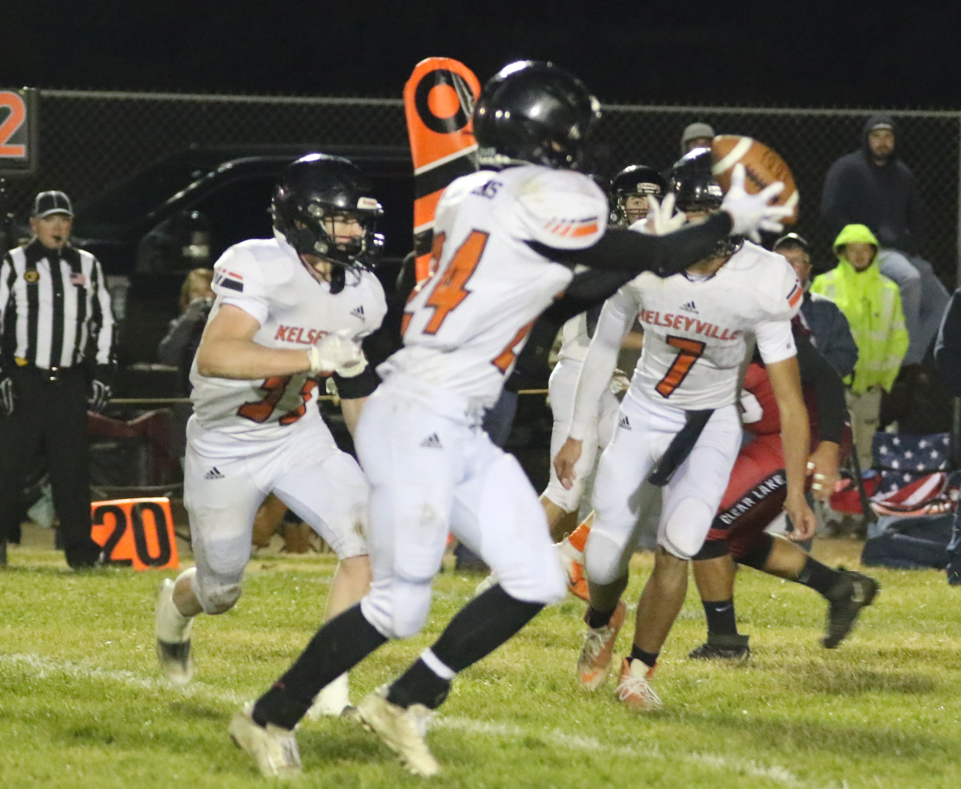 Kelseyville running back Kyle Watkins takes the pitch from quarterback Luke Watkins as Samuel Vanoven trails the play. The three Knights combined for 318 rushing yards and three touchdowns against Clear Lake. (Photos by Minenna Photography)