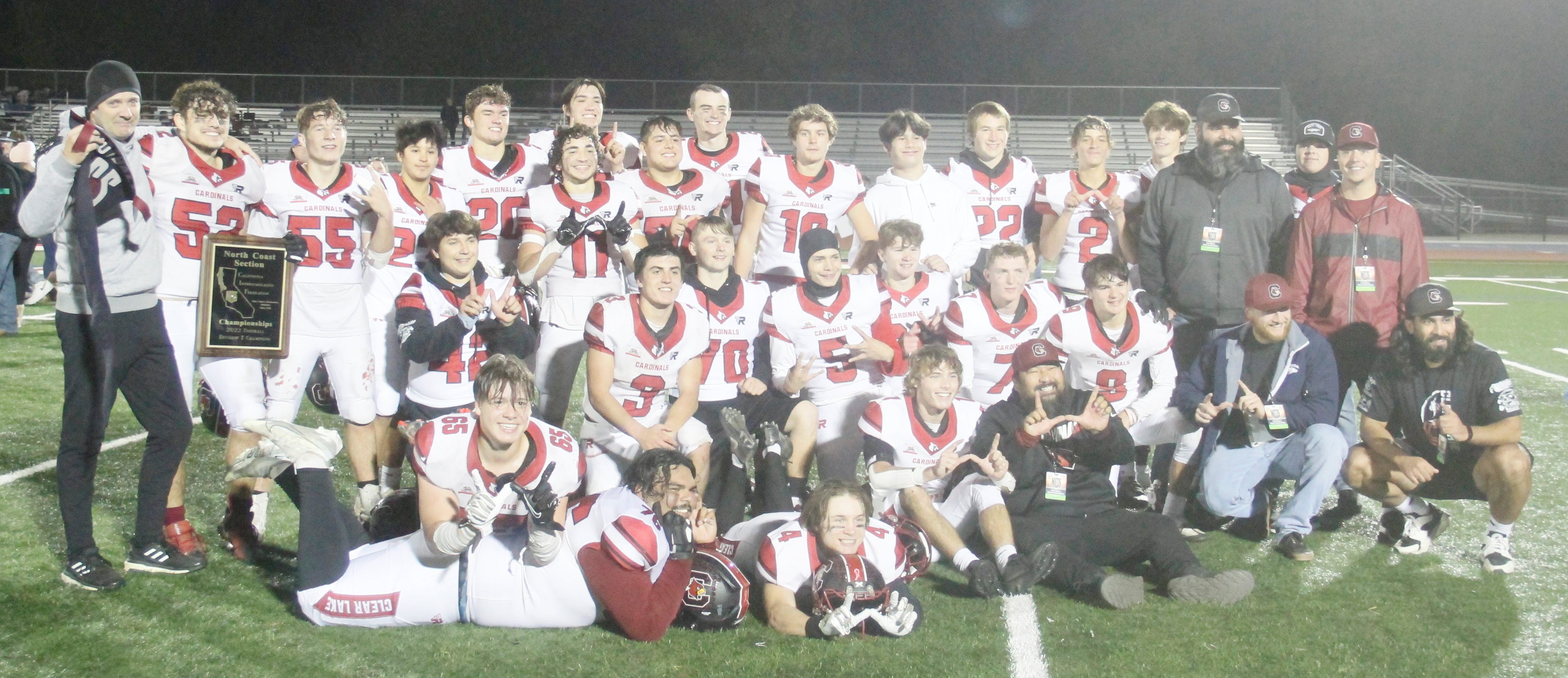 Clear Lake celebrates its 56-55 section win over St. Vincent with a team photo following the awards presentation. The Cardinals improved to 12-1, the most wins ever by a Clear Lake team in a single season. (Photos by Minenna Photography)