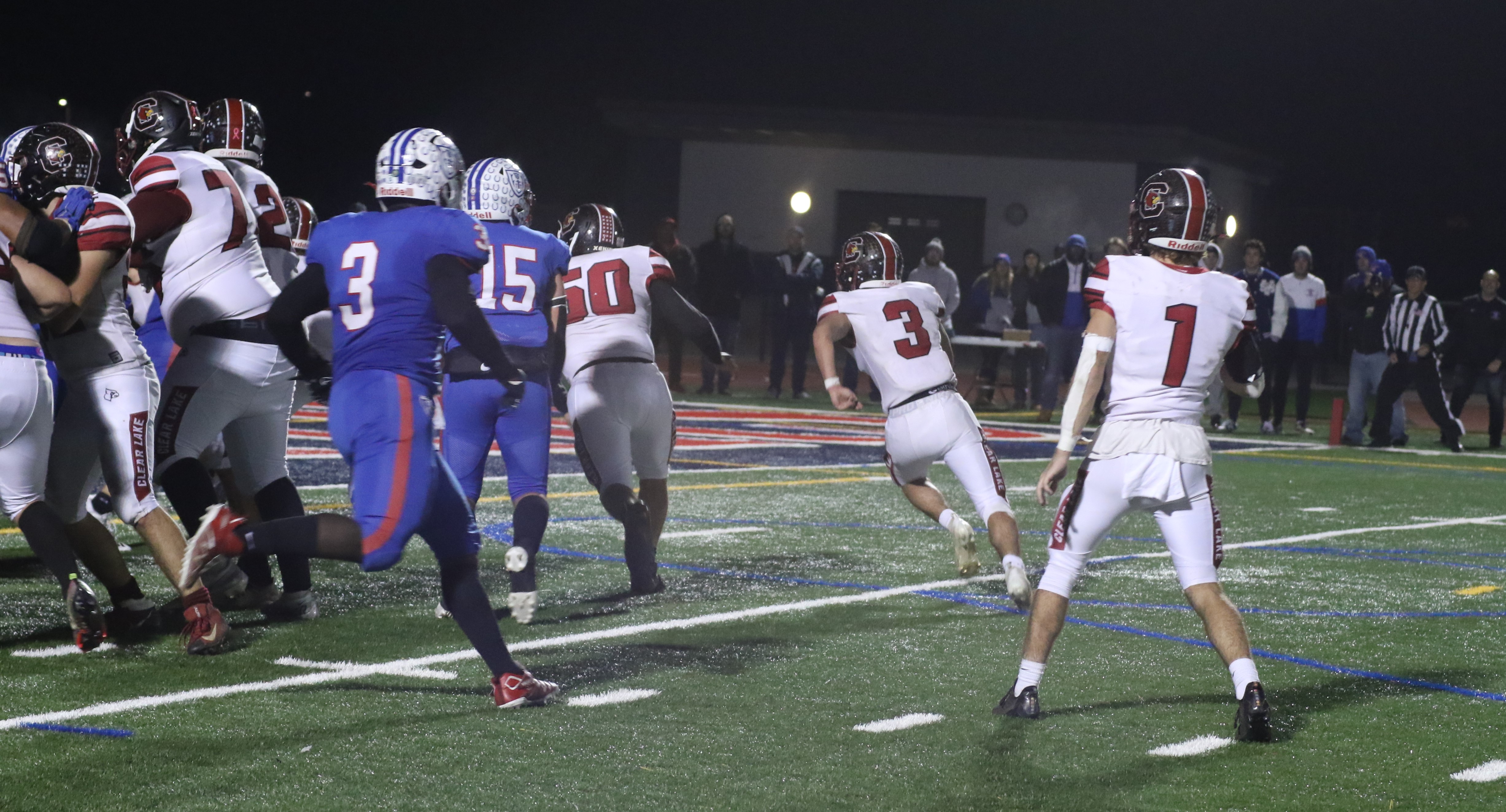 Hank Ollenberger (3) scores his second rushing touchdown of the night to cut St. Vincent's lead to 55-54 with 17 seconds left in the game. The Cardinals then added the two-point conversion to complete a 56-55 victory in the Division 7 section championship game. (Photos by Minenna Photography)