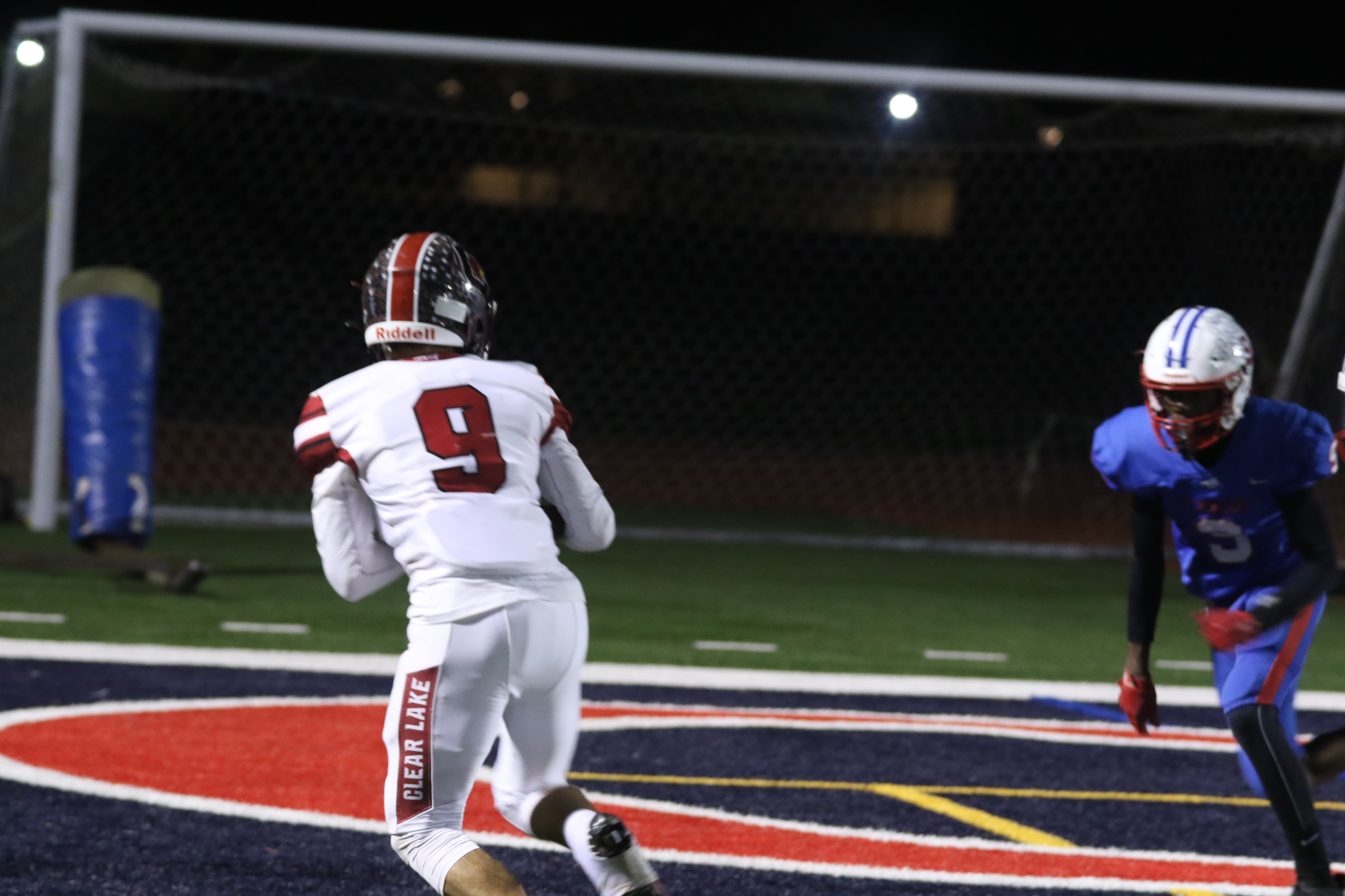 Clear Lake's Jesse Hayes hauls in a pass for a touchdown in the first half. Hayes led the Cardinals with eight receptions for 122 yards and two receiving scores. He added another touchdown on an 81-yard kickoff return. (Photos by Minenna Photography)