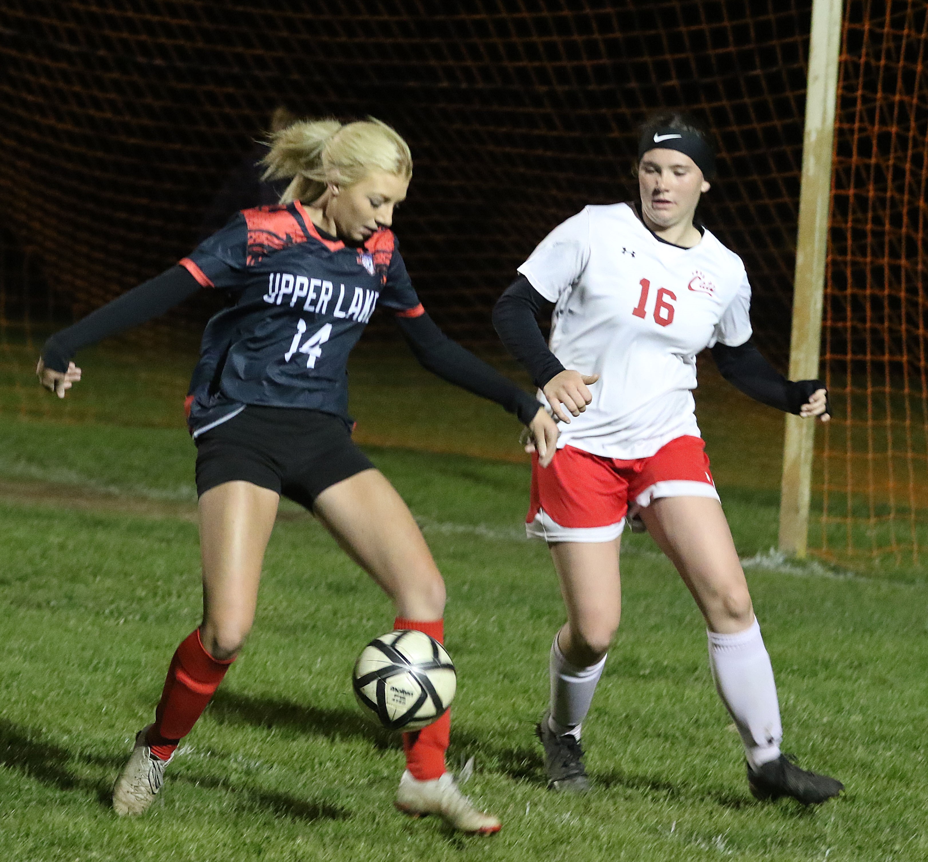 Upper Lake's Ashlyn Rhodes maneuvers into position for a shot on goal against Ferndale during the Cougars' 3-2 overtime win over Ferndale on Wednesday night in Upper Lake. (Photos by Minenna Photography)