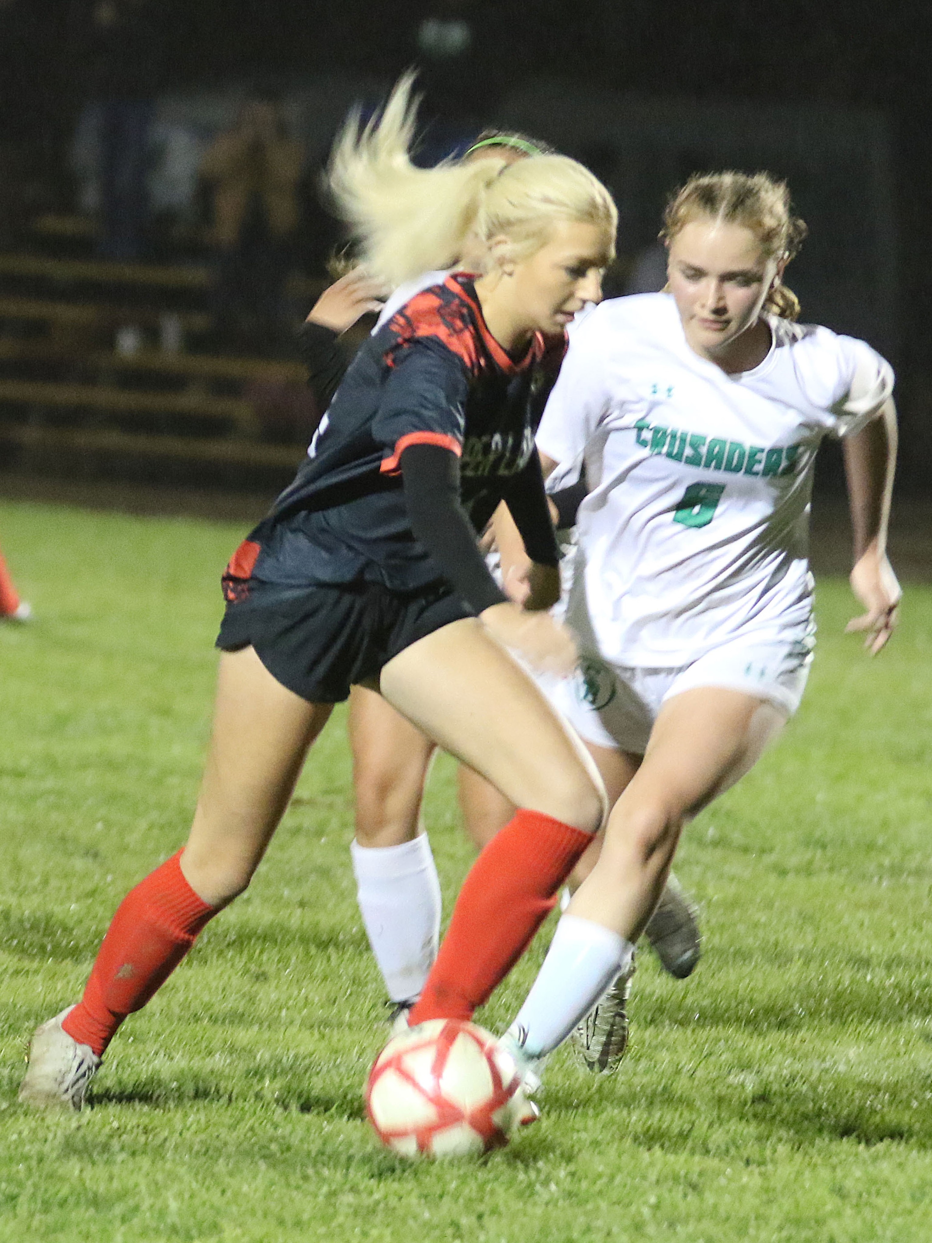Upper Lake's Ashlyn Rhodes maneuvers around a St. Bernard's play. Rhodes scored the Cougars' lone goal with an assist from teammate Nya Marcks. (Photos by Minenna Photography)