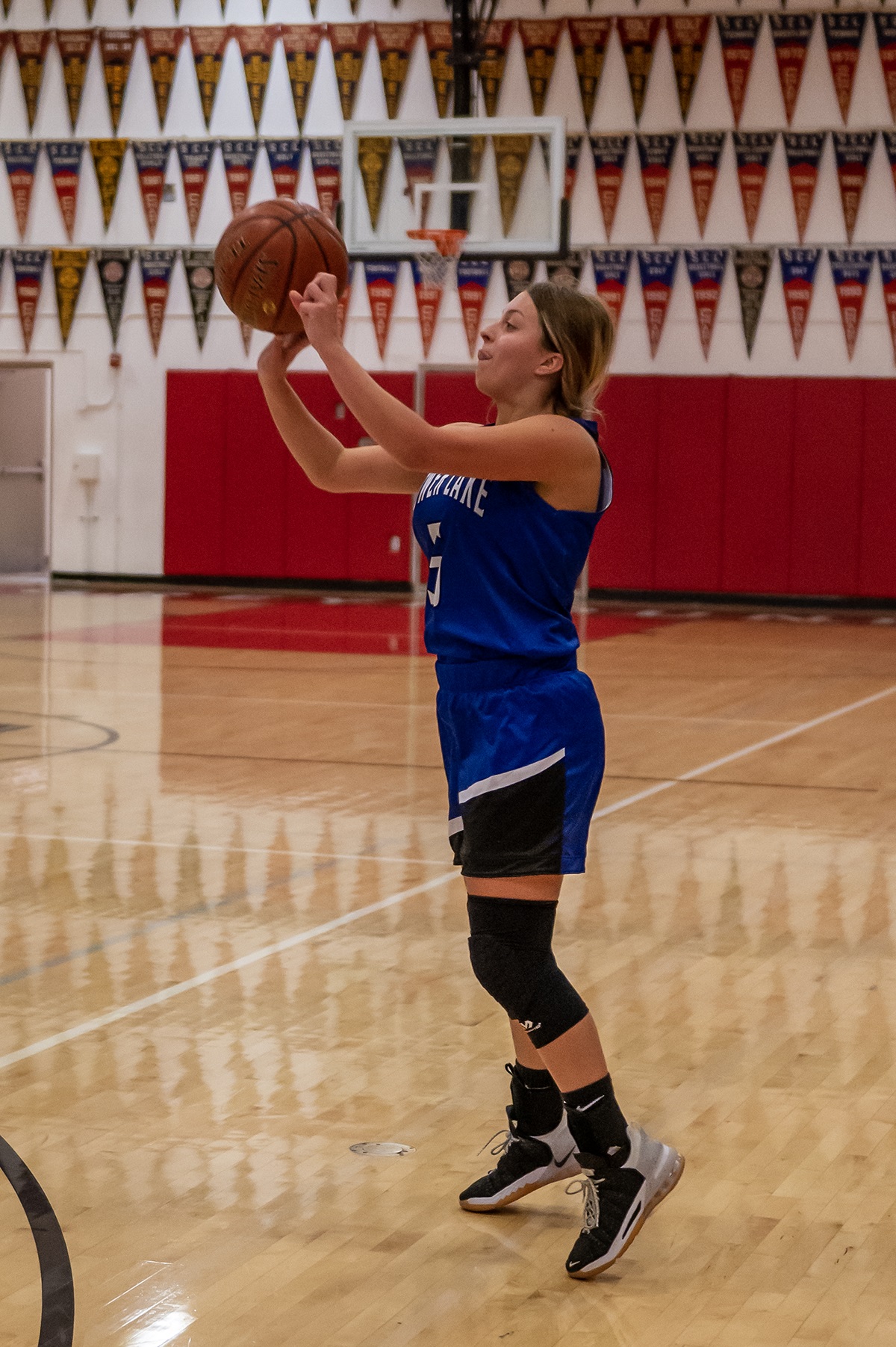 Lower Lake's Tiahna Tubbs pulls up for a shot against Healdsburg. Tubbs led the Trojans with six points.