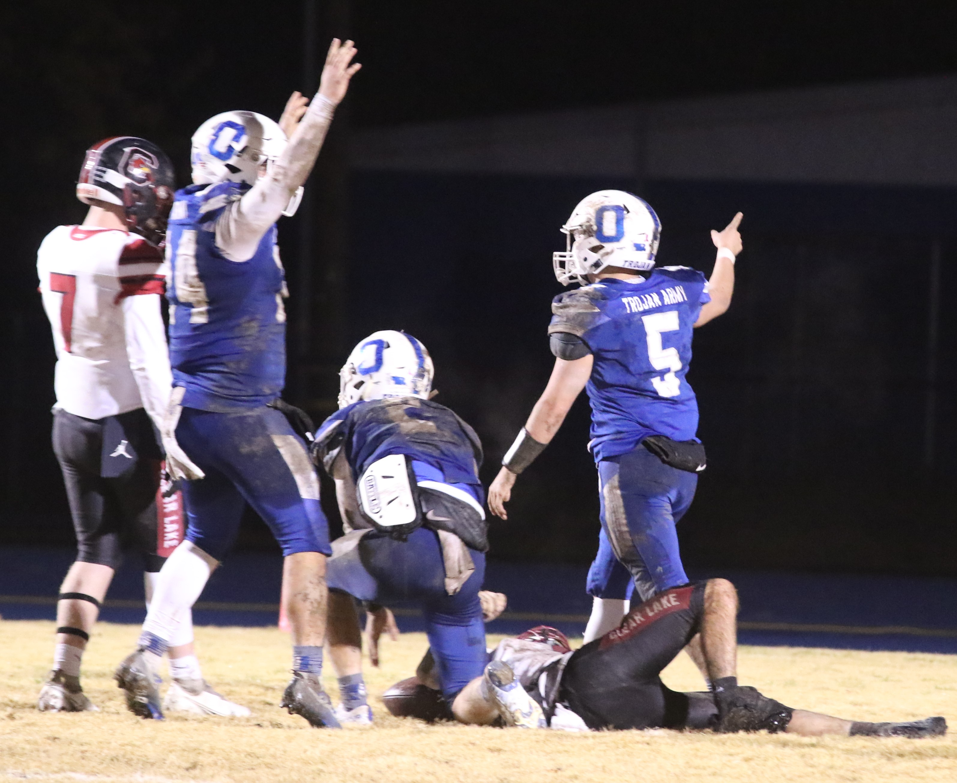 Orland recovered a fumbled Clear Lake kickoff return late in the fourth quarter to set up its final touchdown in a 42-21 win over Clear Lake on Saturday night at Orland High School where the Trojans improved to 14-0. (Photos by Minenna Photography)