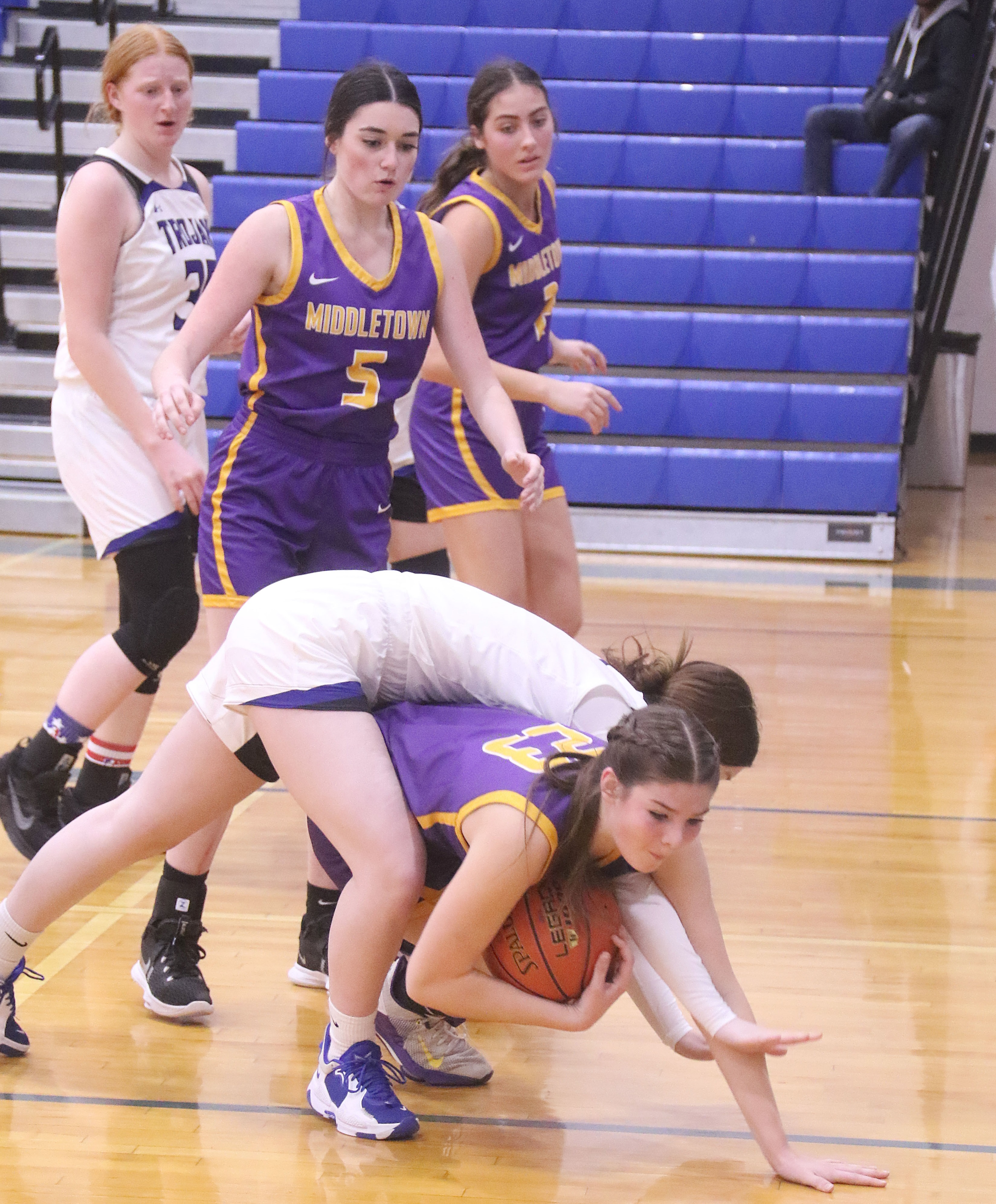 Middletown's Mia Hoogendoorn comes away with the loose ball against Lower Lake. Hoogendoorn's triple-double helped lead the Mustangs to a 61-21 win Tuesday night in Lower Lake. (Photos by Minenna Photography)