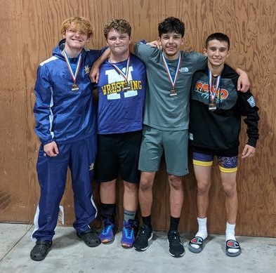 Middletown's (from left) Eli Moreno, Steven Peterson, David Sypnicki and Dominick Clark all brought home medals from the Doc Peterson Tournament in Orland. (Courtesy photos)