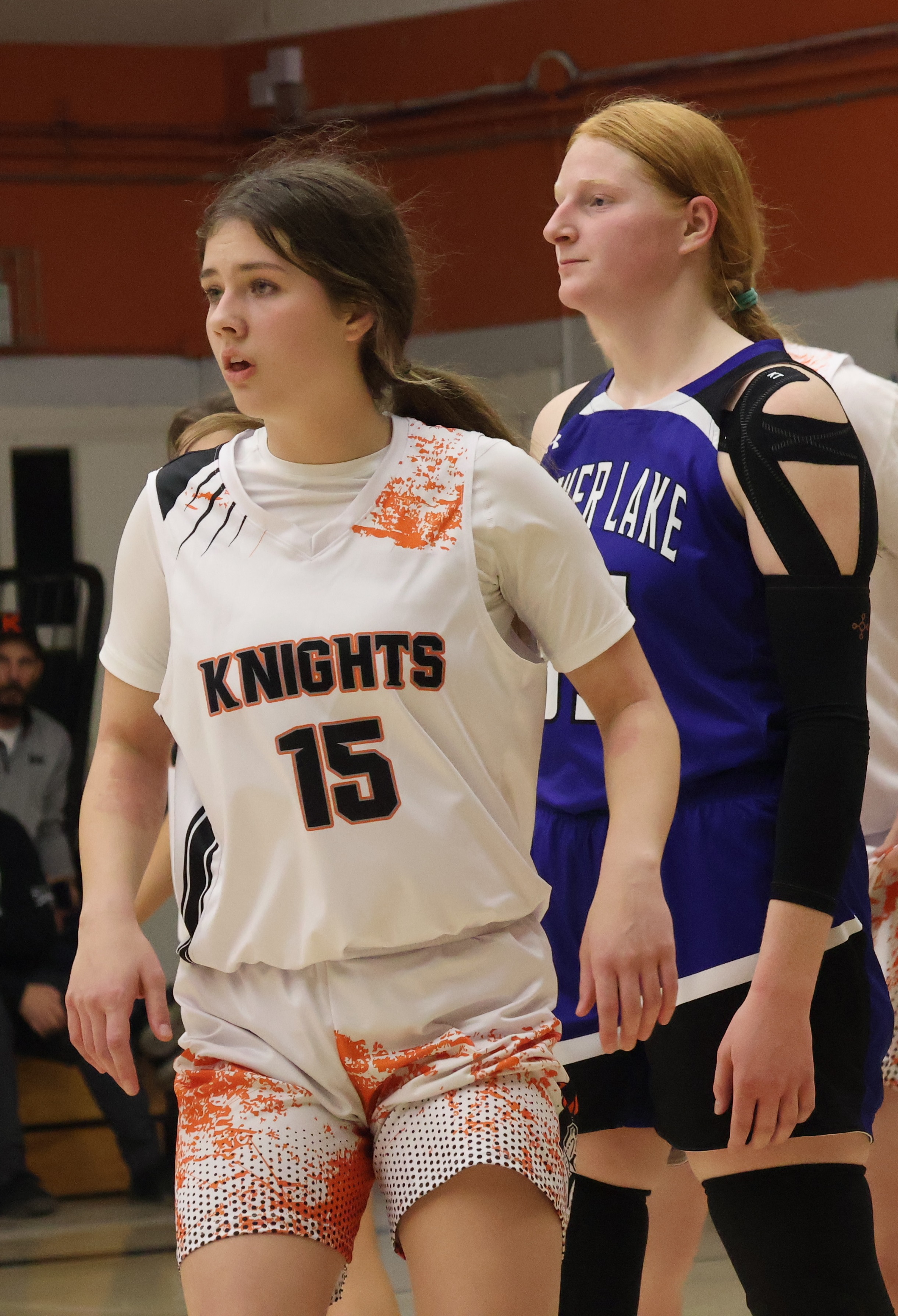 Kelseyville's Lilly Wiser (15) and Lower Lake's Rebecca Theodorou look on during Friday's action. (Photos by Brian Sumpter)