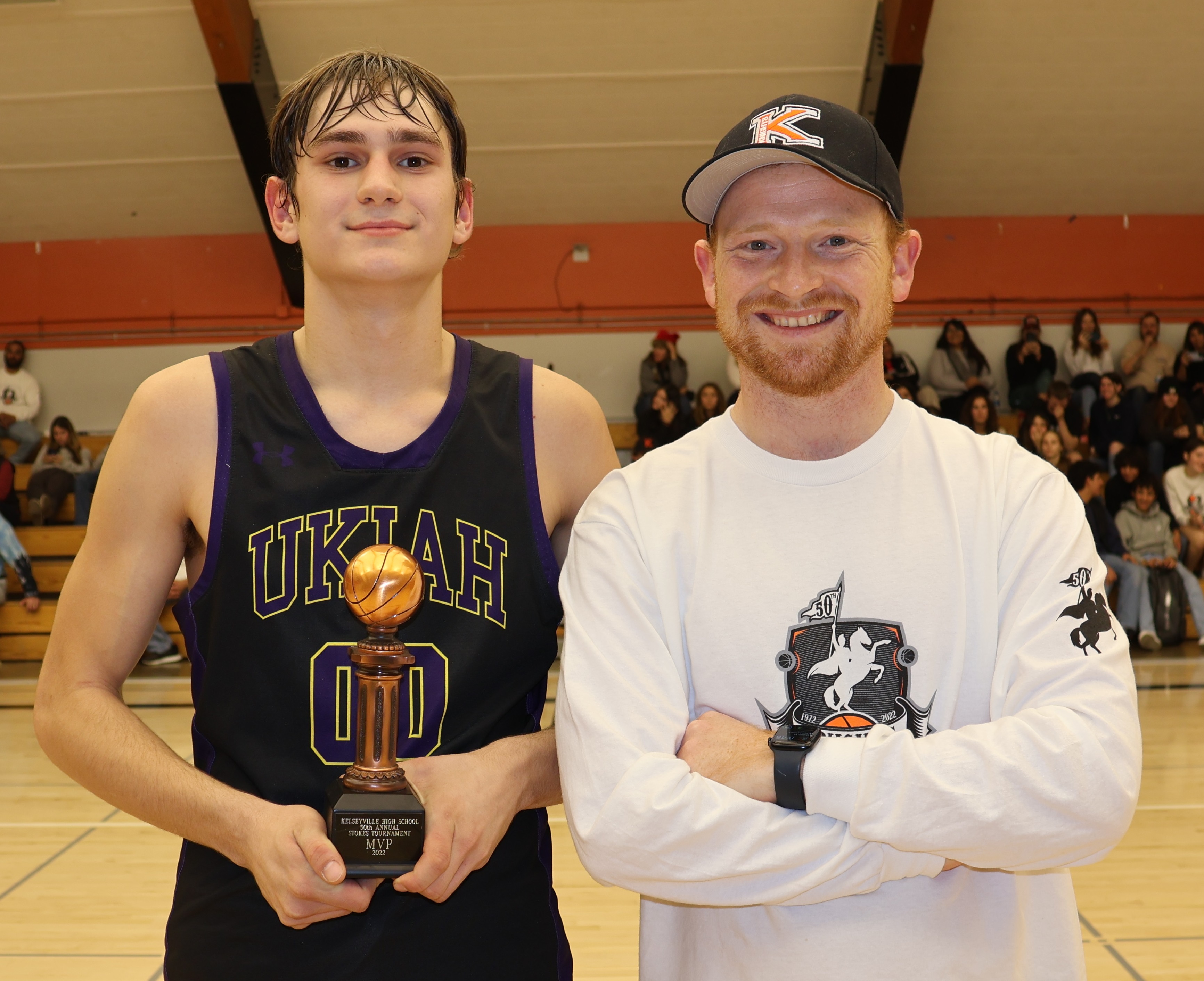 Stokes Tournament MVP Marcus Fenk of Ukiah High School receives his award from Kelseyville High athletic director Shane Boehlert. (Photos by Brian Sumpter)