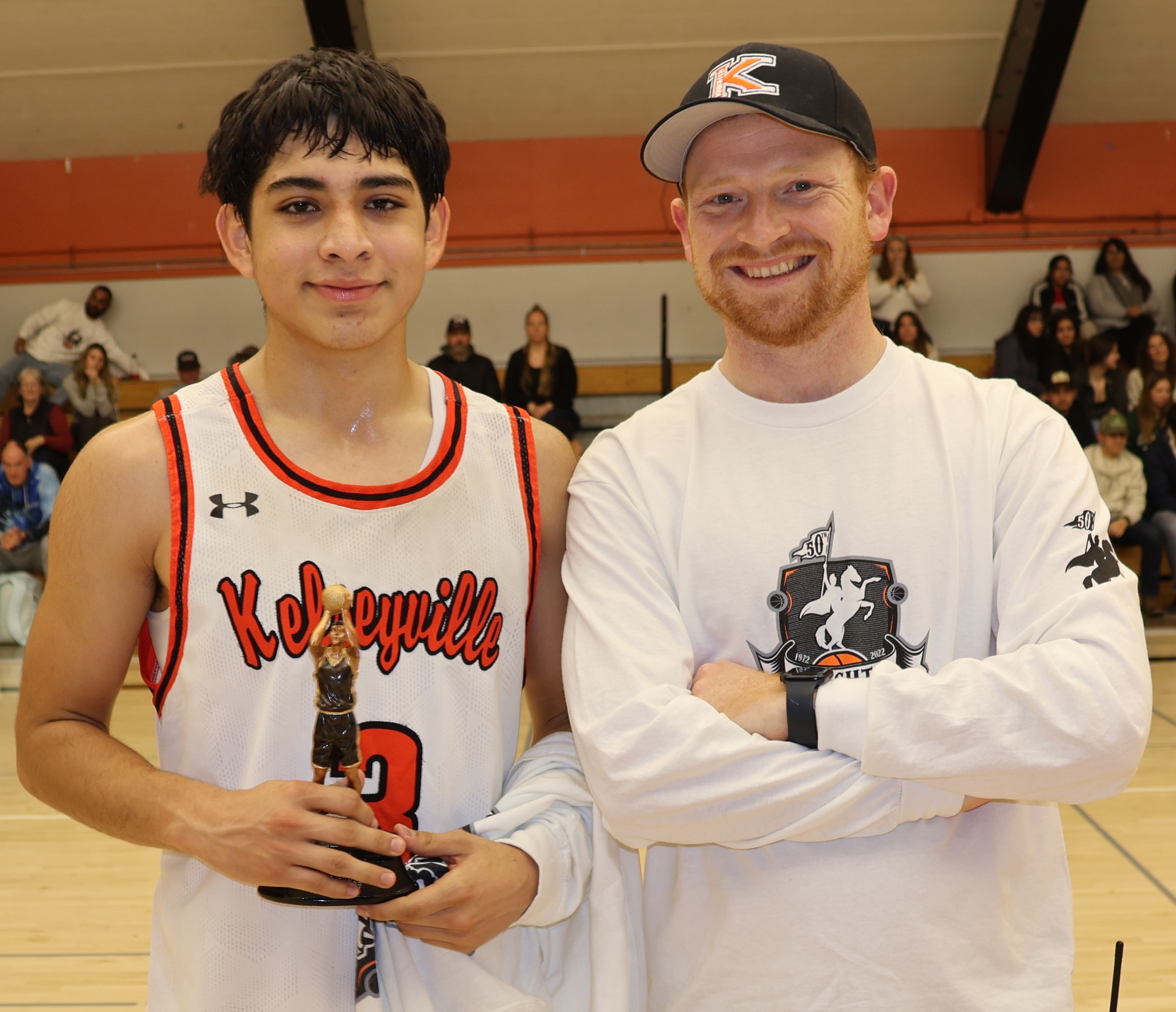 Manny Acosta earned All-Tournament honors after scoring a team-best 17 points in a 68-53 loss to Ukiah on Saturday night. Kelseyville High School athletic director Shane Boehlert presented him with his award. (Photos by Brian Sumpter)