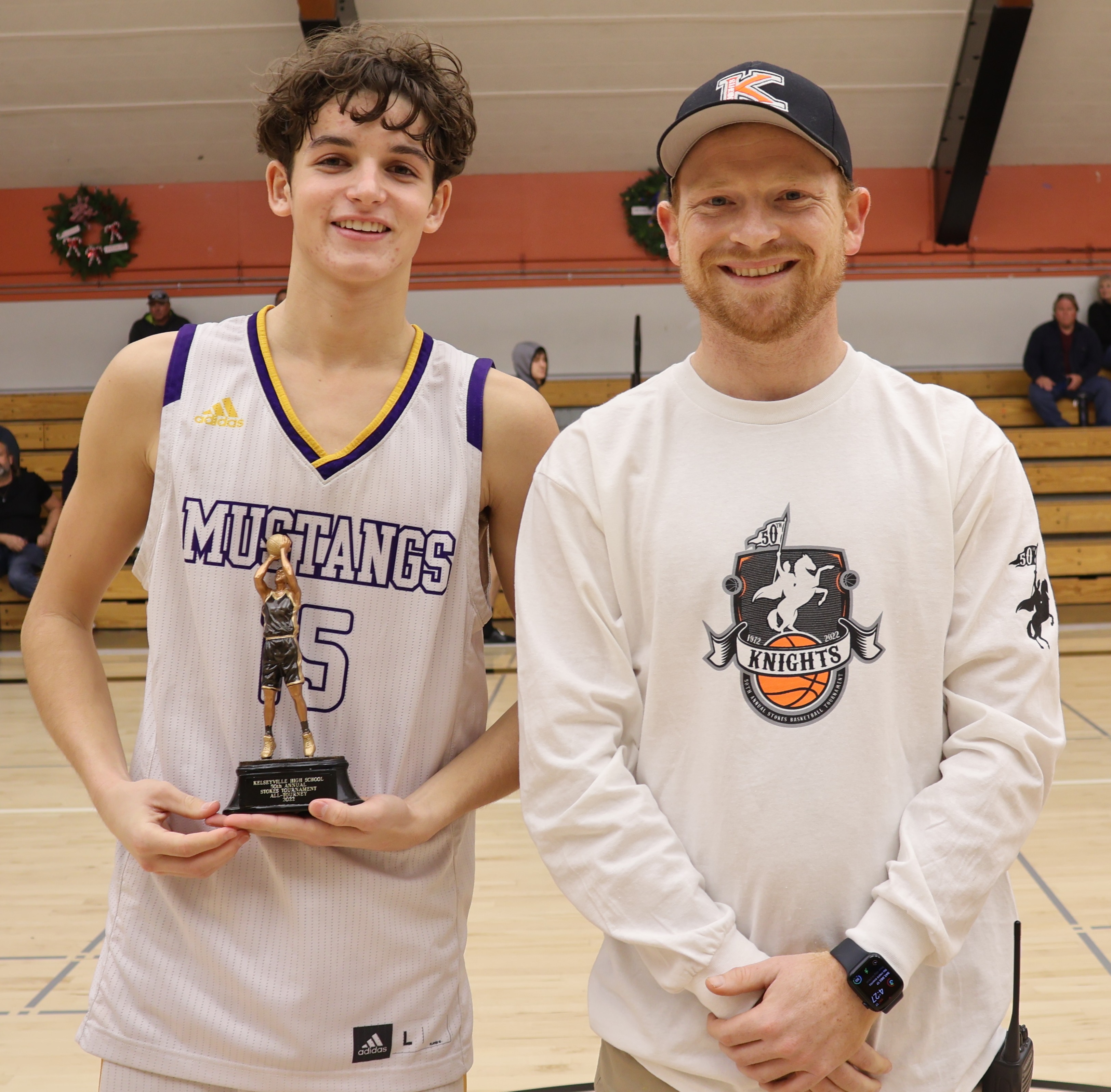 Middletown's Wyatt Moore received his All-Tournament award from Kelseyville High athletic director Shane Boehlert. (Photos by Brian Sumpter)