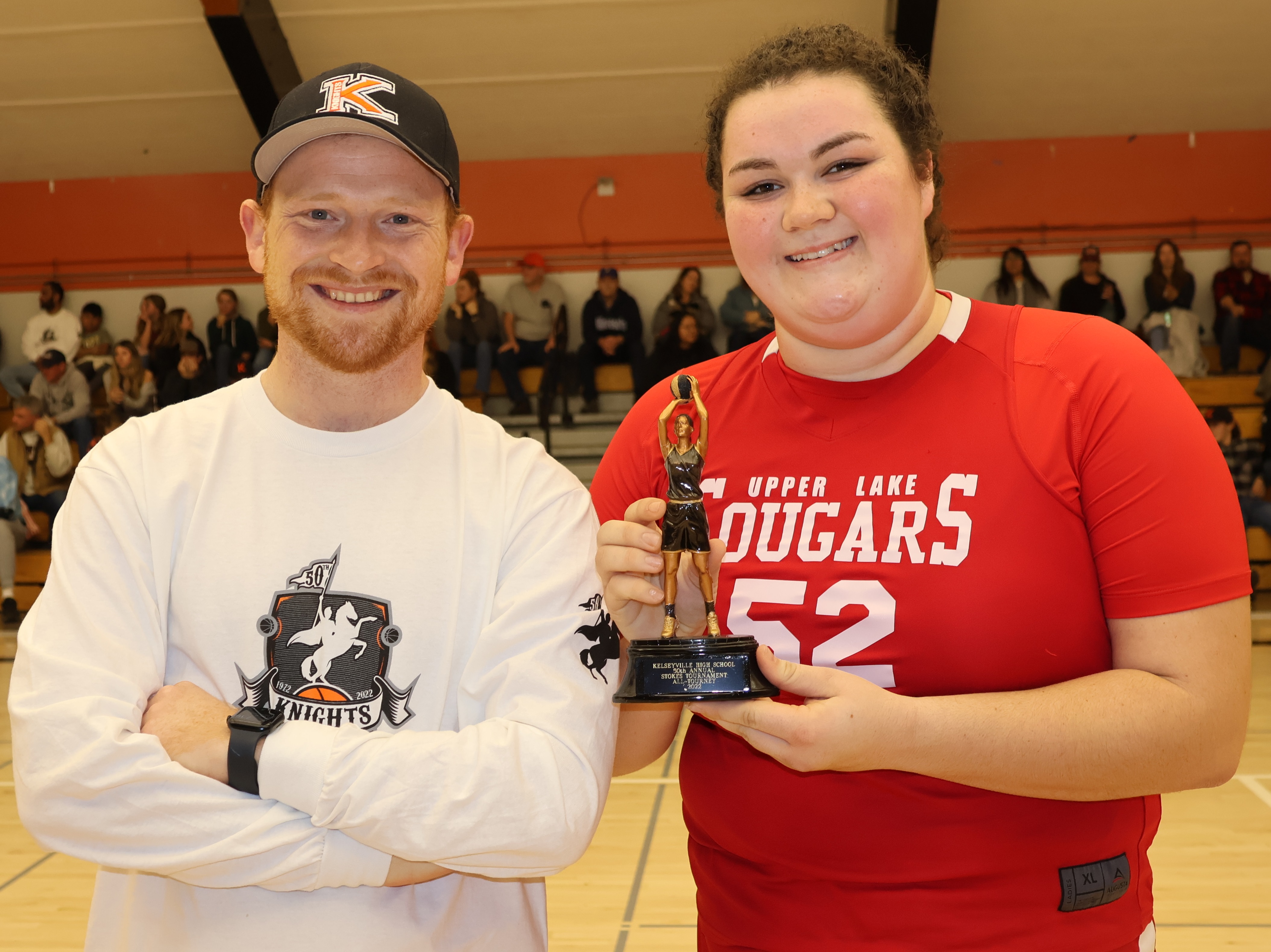 Kelseyville High School athletic director Shane Boehlert presented Upper Lake's Taylar Minnis with her All-Tournament award. (Photos by Brian Sumpter)