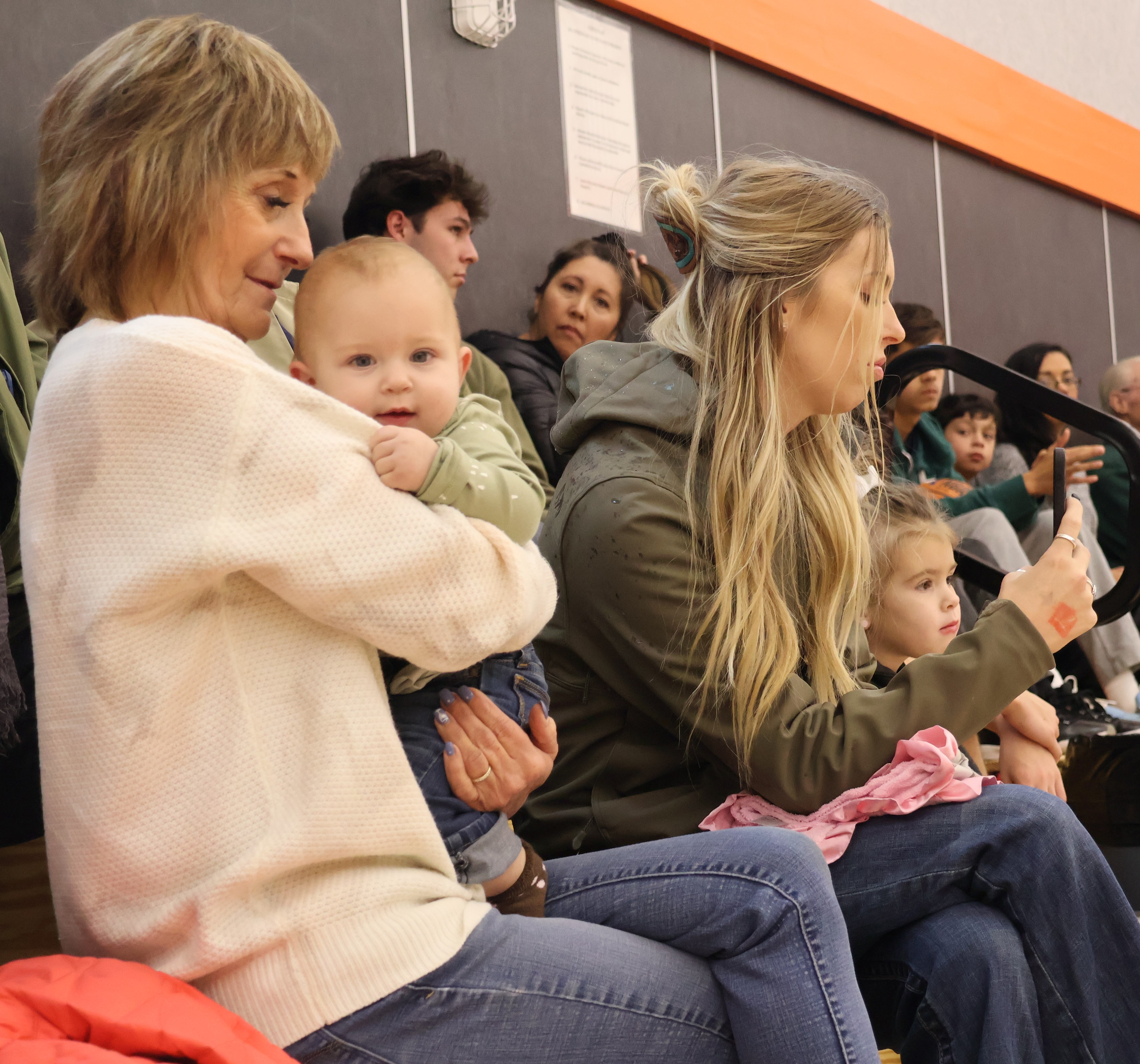 Among those in attendance for the tournament dedication ceremony Saturday were John Berry's wife Julie, who is holding 8-month-old granddaughter Riley Spain, daughter Liz Berry, and 3-year-old granddaughter Delaney Spain. (Photos by Brian Sumpter)
