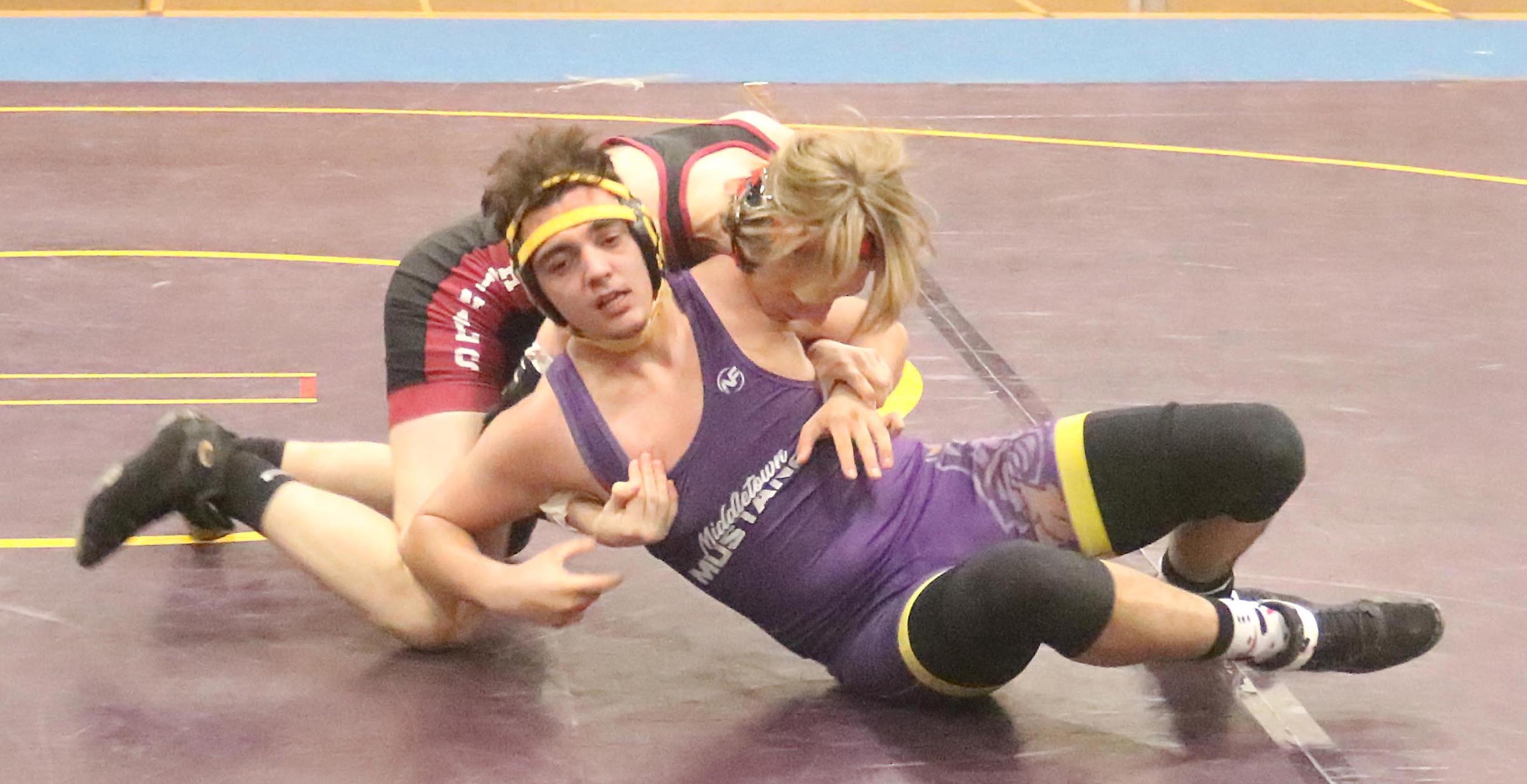 Clear Lake's Asher Reese (top) scored a first-round pin over Middletown's Tyler Torres at 152 pounds. (Photos by Minenna Photography)