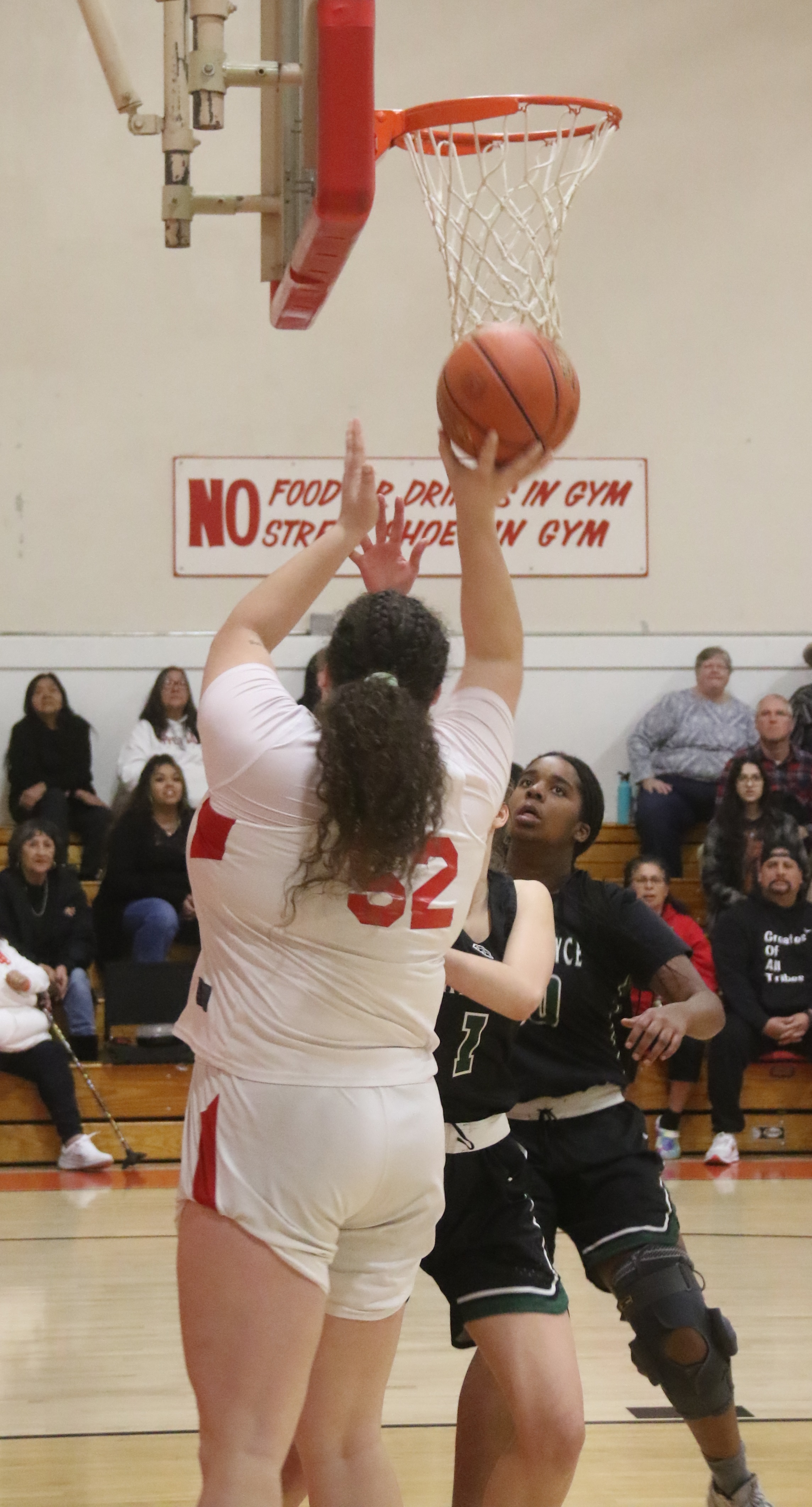 Upper Lake's Taylar Minnis scores two of her team-leading 20 points on this short jumper Friday night. Minnis dominated the Jayhawks down low. (Photos by Minenna Photography)