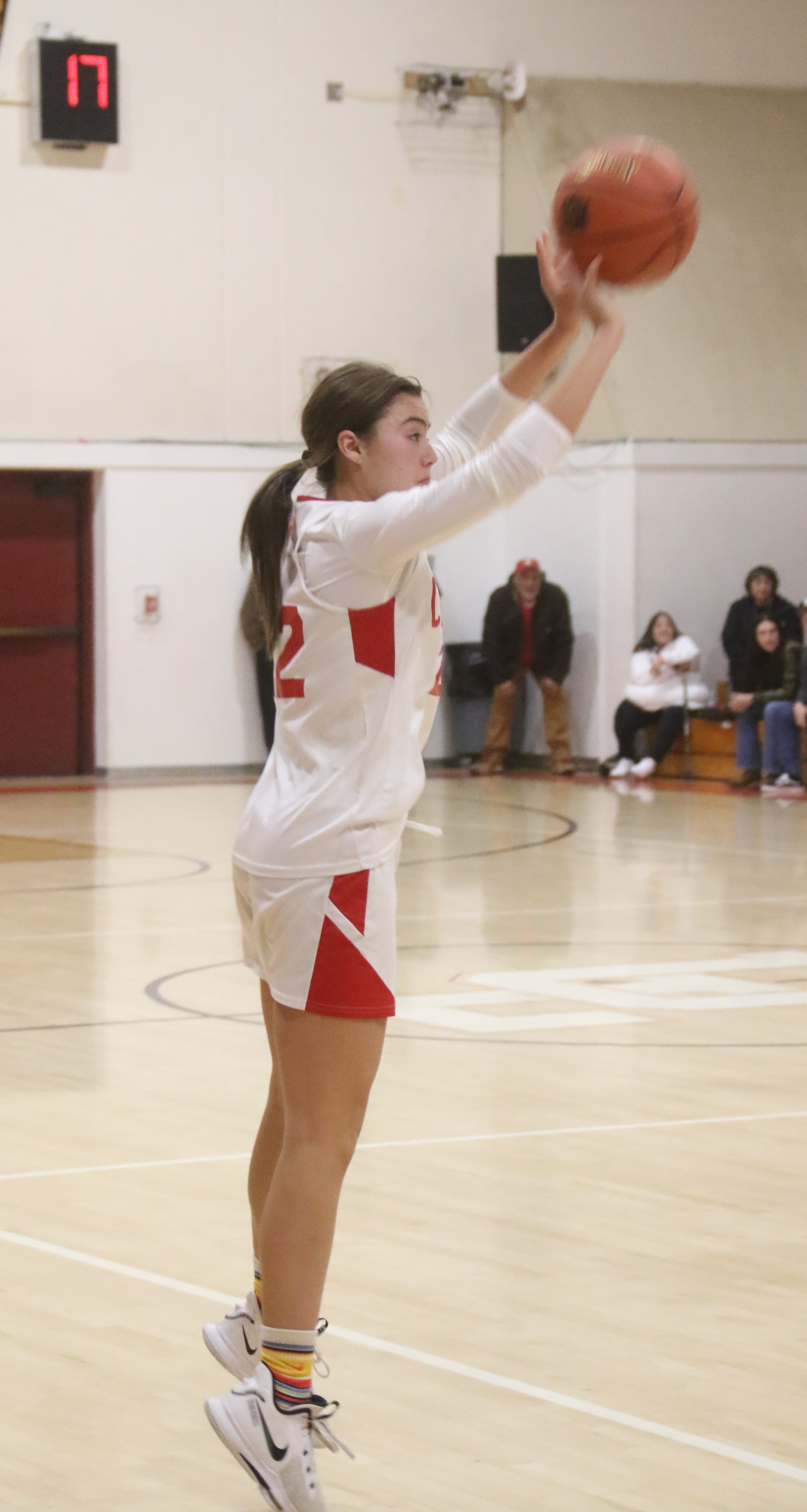 Upper Lake's Nya Marcks launches a 3-pointer. (Photos by Minenna Photography)