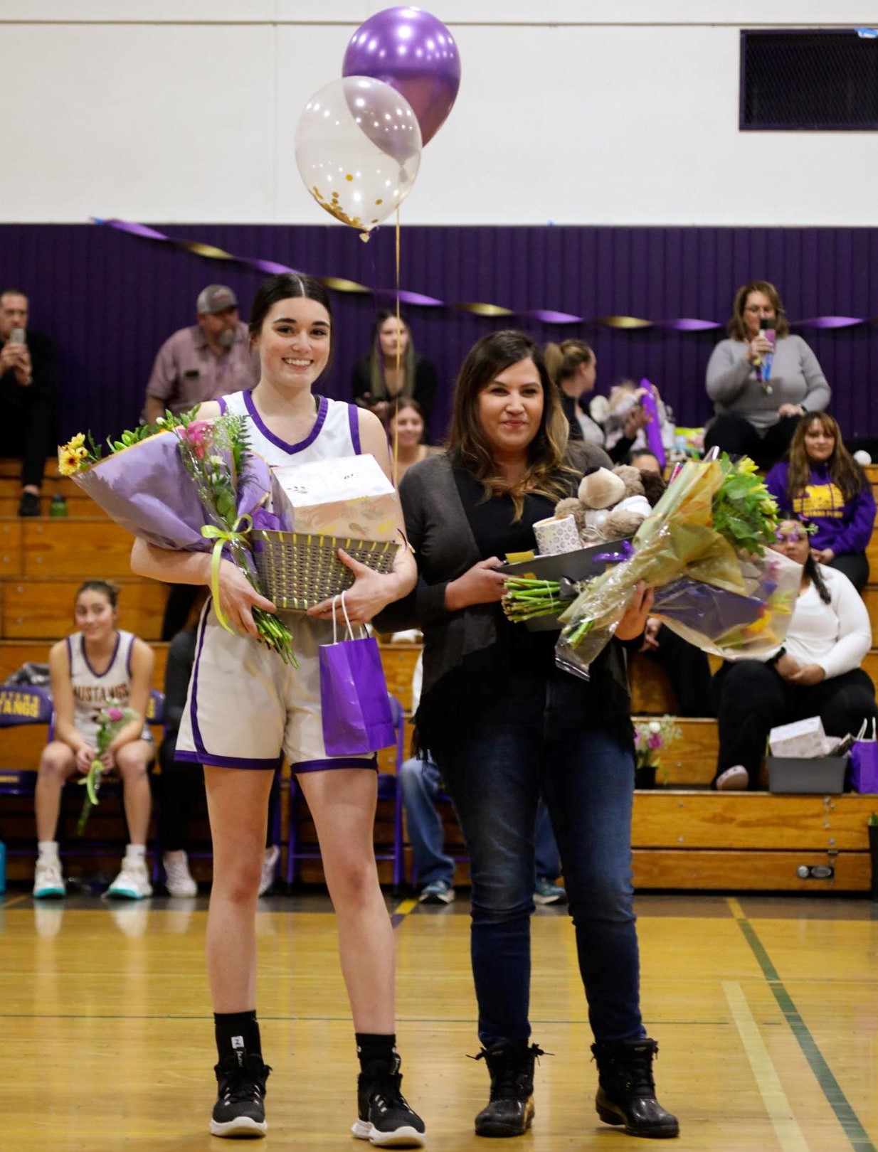 Middletown's Kamryn Atkins pulled down 19 rebounds on senior night as the Mustangs beat Roseland University Prep to wrap up the regular season. (Photos by Coral Pratt)