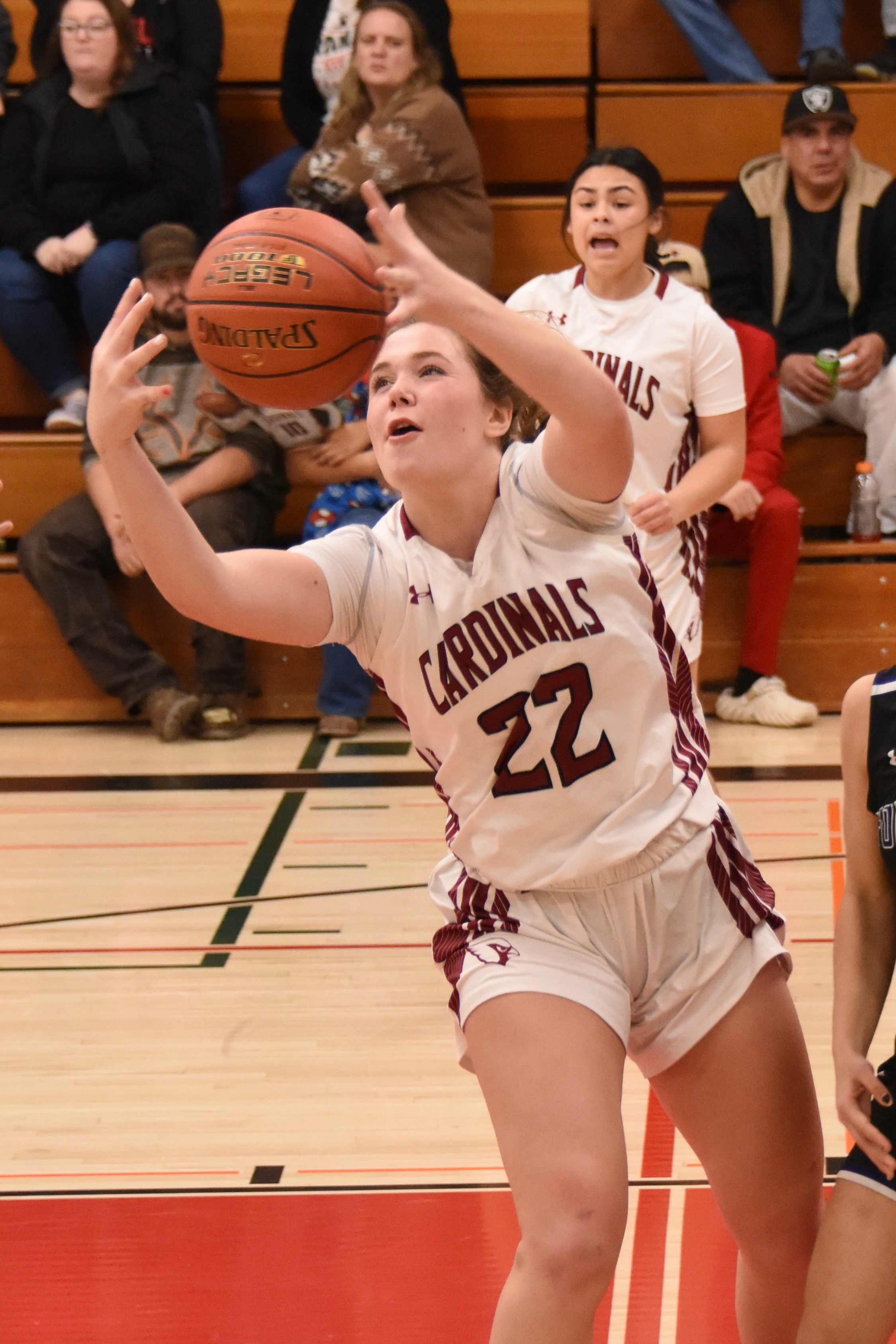 Clear Lake's Abby Mertle comes down with the rebound against Fort Bragg. (Photos courtesy of Trett Bishop)