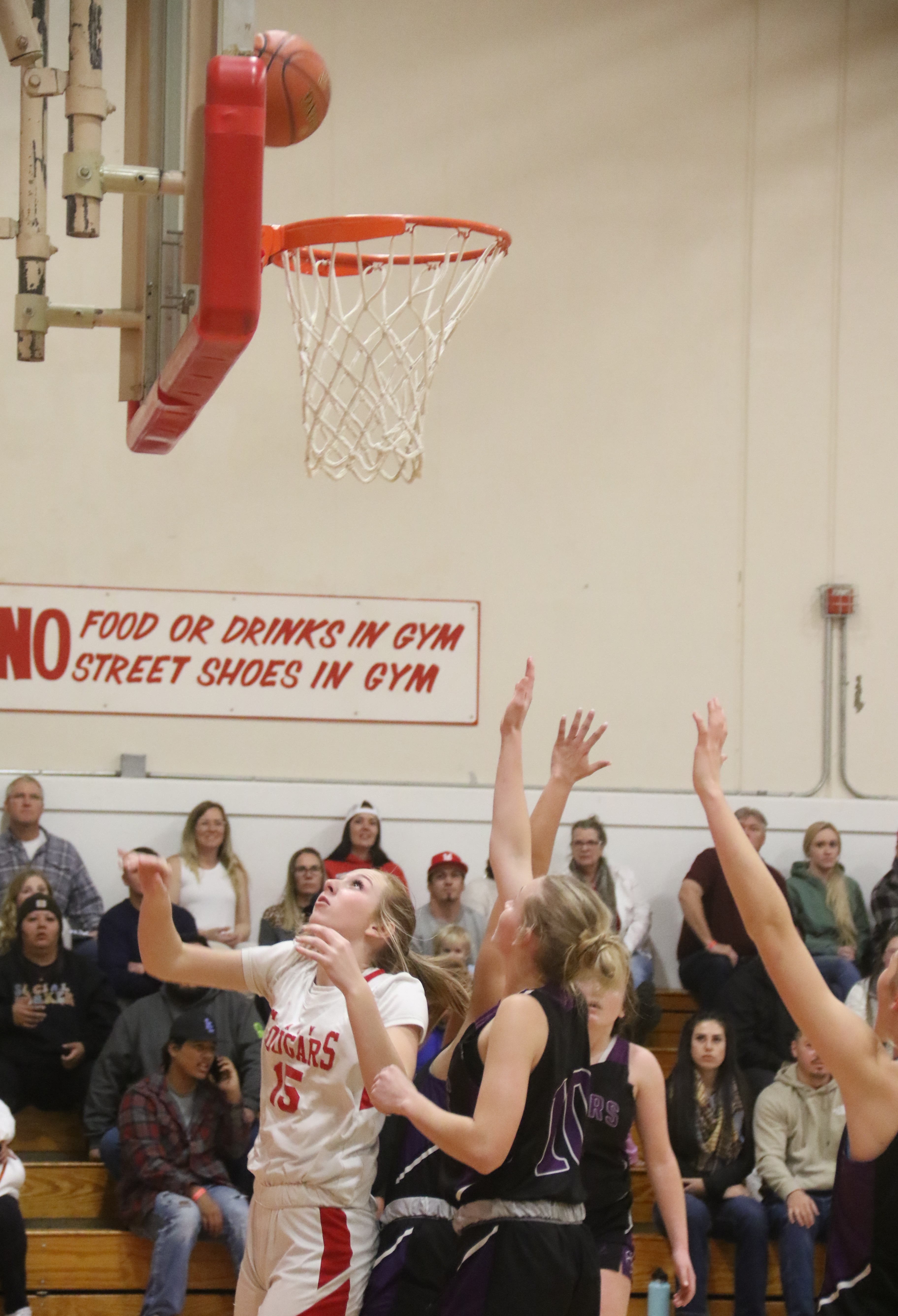 Upper Lake's Madison Noble sets up for the rebound during action in the first half. (Photos by Minenna Photography)