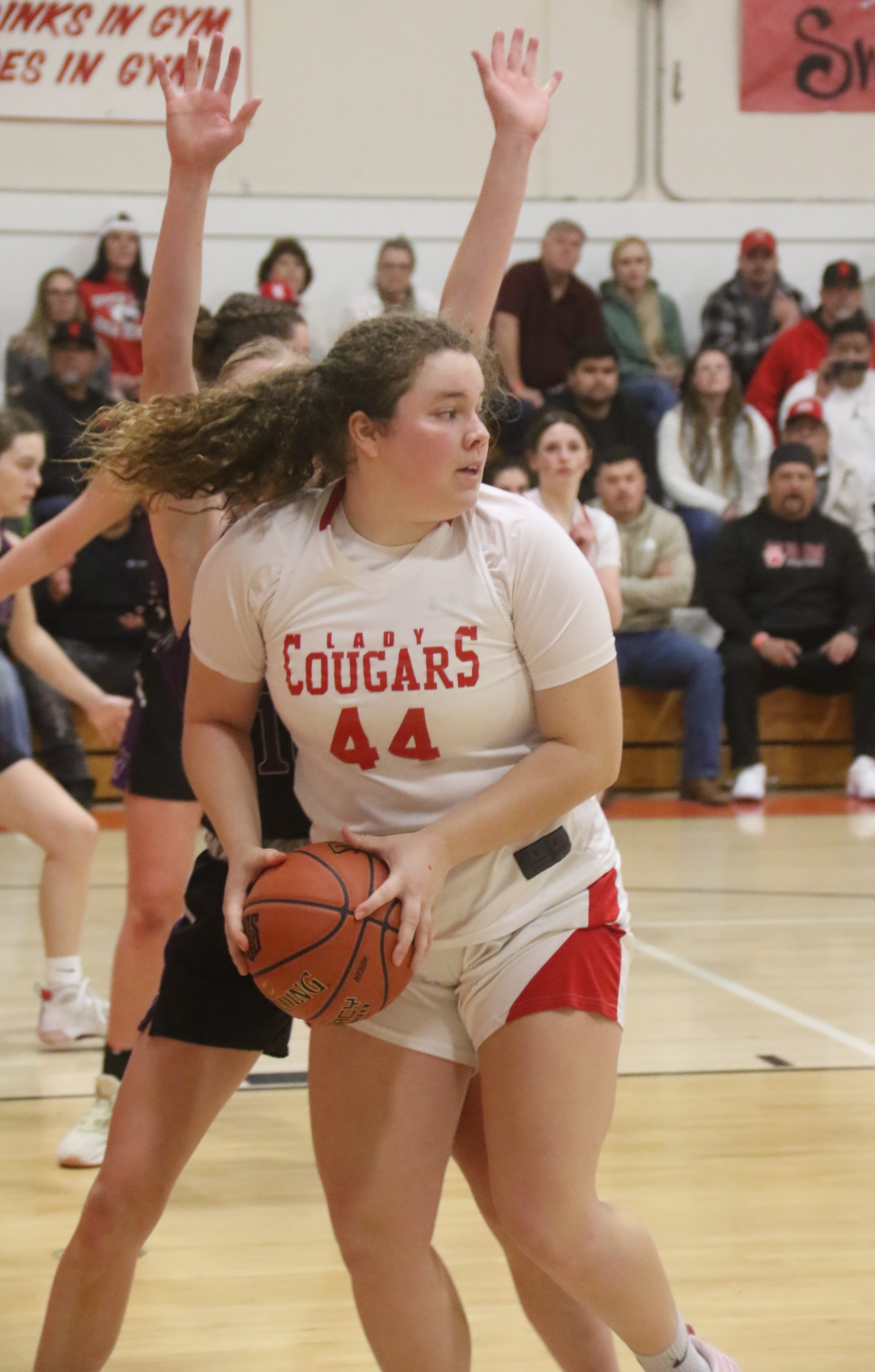 Upper Lake's Kali Minnis looks to pass the ball after her path to the basket was blocked by a Portola defender. (Photos by Minenna Photography)