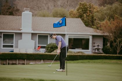 Middletown's Cooper Johnson tied for the low round Thursday as he carded a 74 during a Coastal Mountain Conference South match at Sugarloaf Golf Course in Santa Rosa. Along with teammate Dom Williams, he also came to the assistance of a man who had fallen in his backyard that borders the golf course. (Courtesy photos)