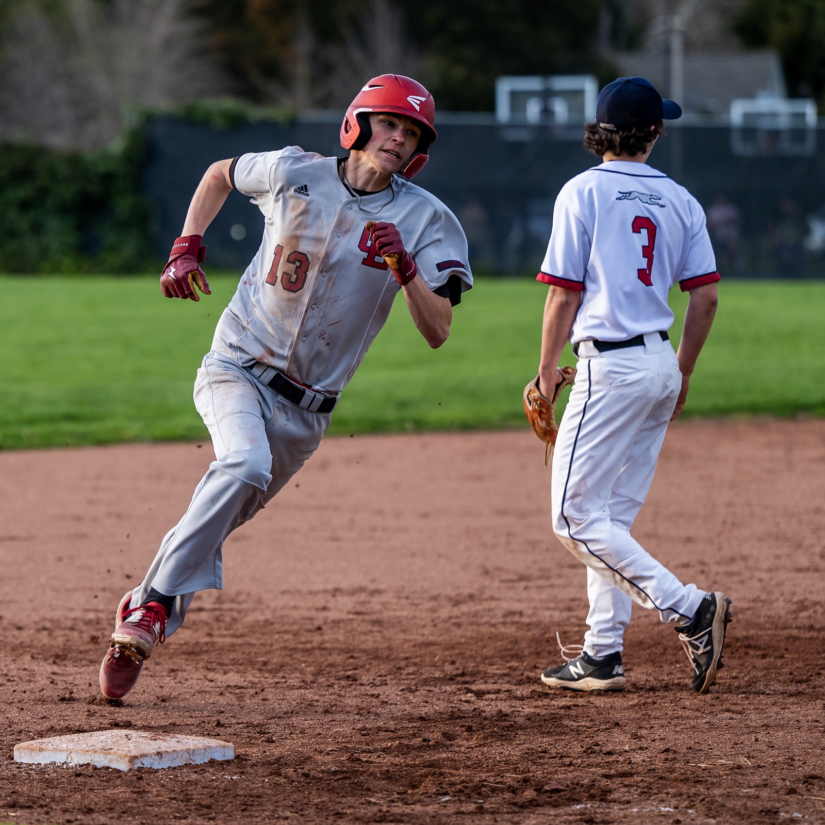 Clear Lake's Greyson Wind races around third base on his way home. (Photos courtesy of Michael Lucid)