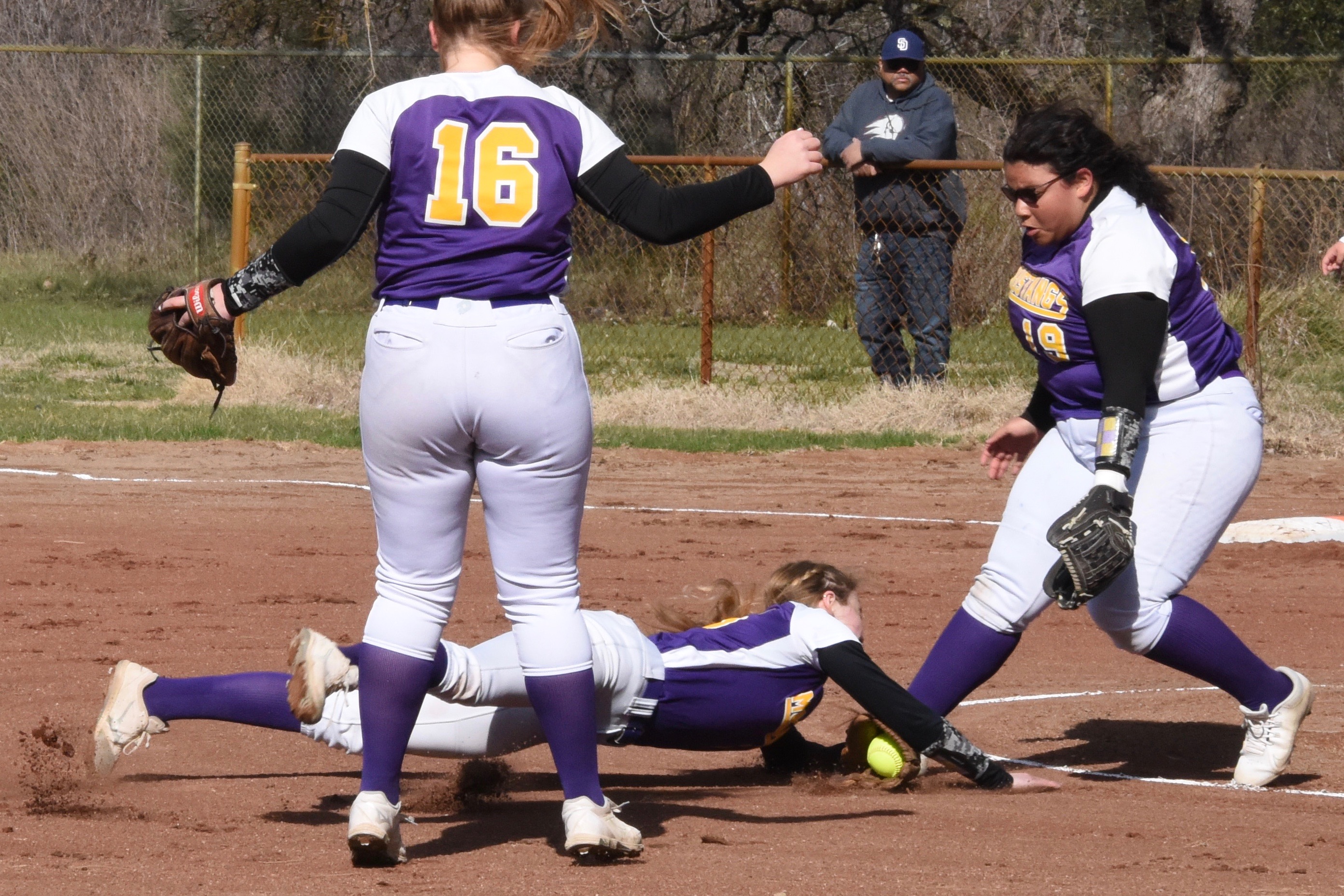 Middletown shortstop Cora Holley makes a diving grab of a popup near the pitching rubber during Friday's action in Kelseyville. (Photos courtesy of Trett Bishop)