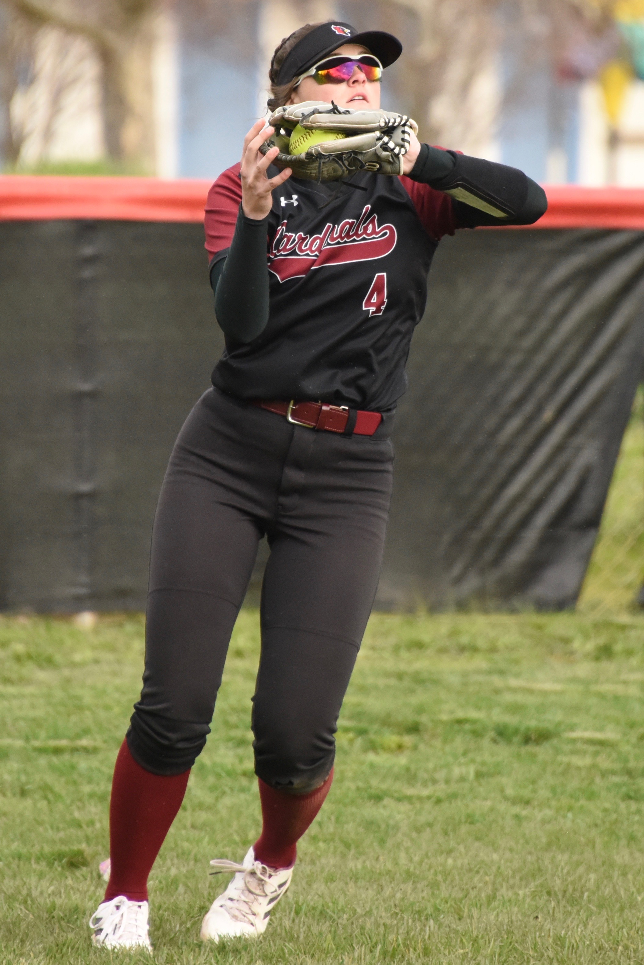 Clear Lake outfielder Montana Wells records an out during the Cardinals' 10-0 win over Lower Lake. Wells also went 2-for-2 at the plate with a triple and RBI. (Photos courtesy of Trett Bishop)