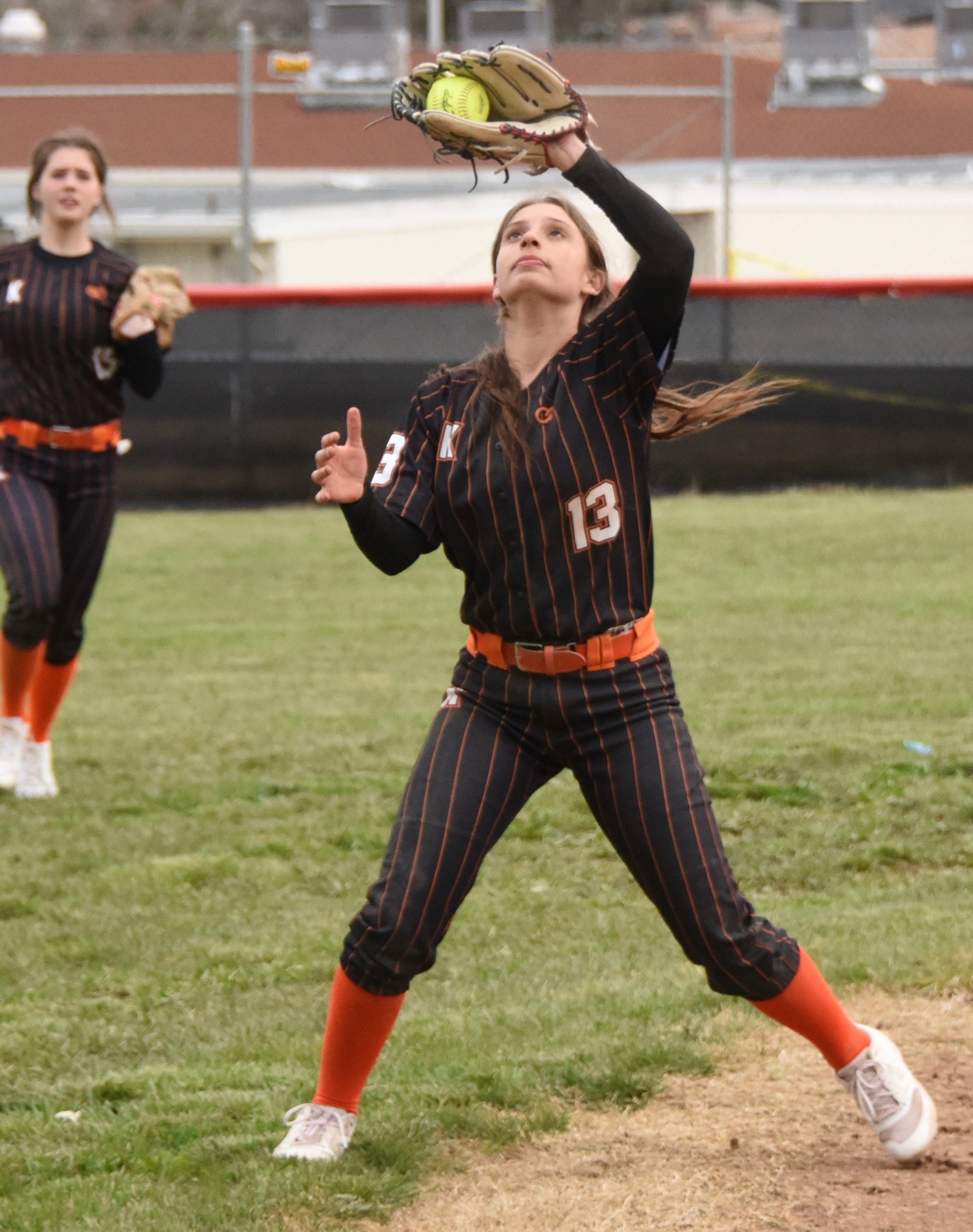 Kelseyville's Cali Schnabl gloves a popup against Clear Lake. (Photos courtesy of Trett Bishop)