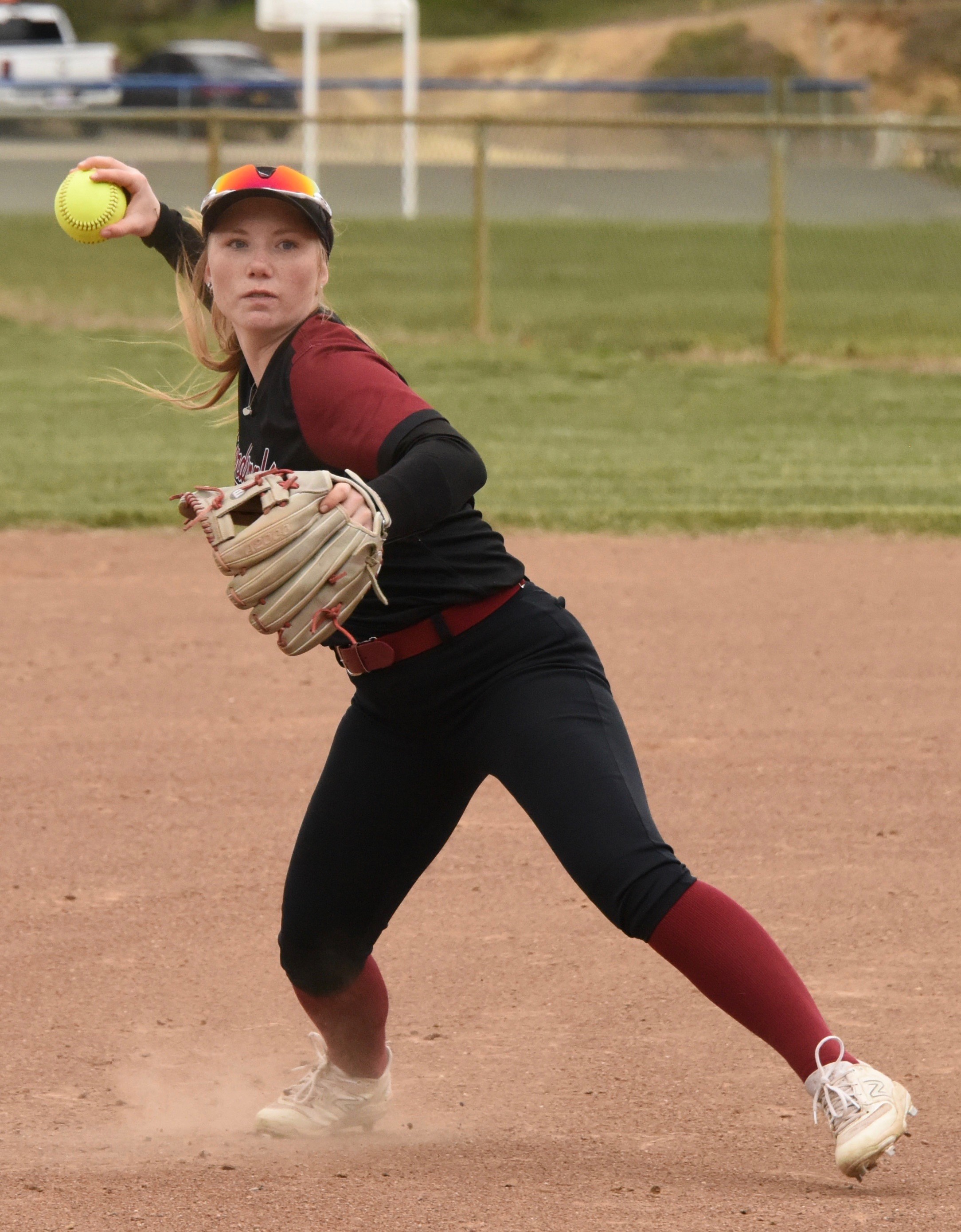 Clear Lake shortstop Amber Smart readies a throw against Kelseyville. Smart had a big day at the plate, going 4-for-4 with a double and a RBI in the Cardinals' 13-4 victory. (Photos courtesy of Trett Bishop)