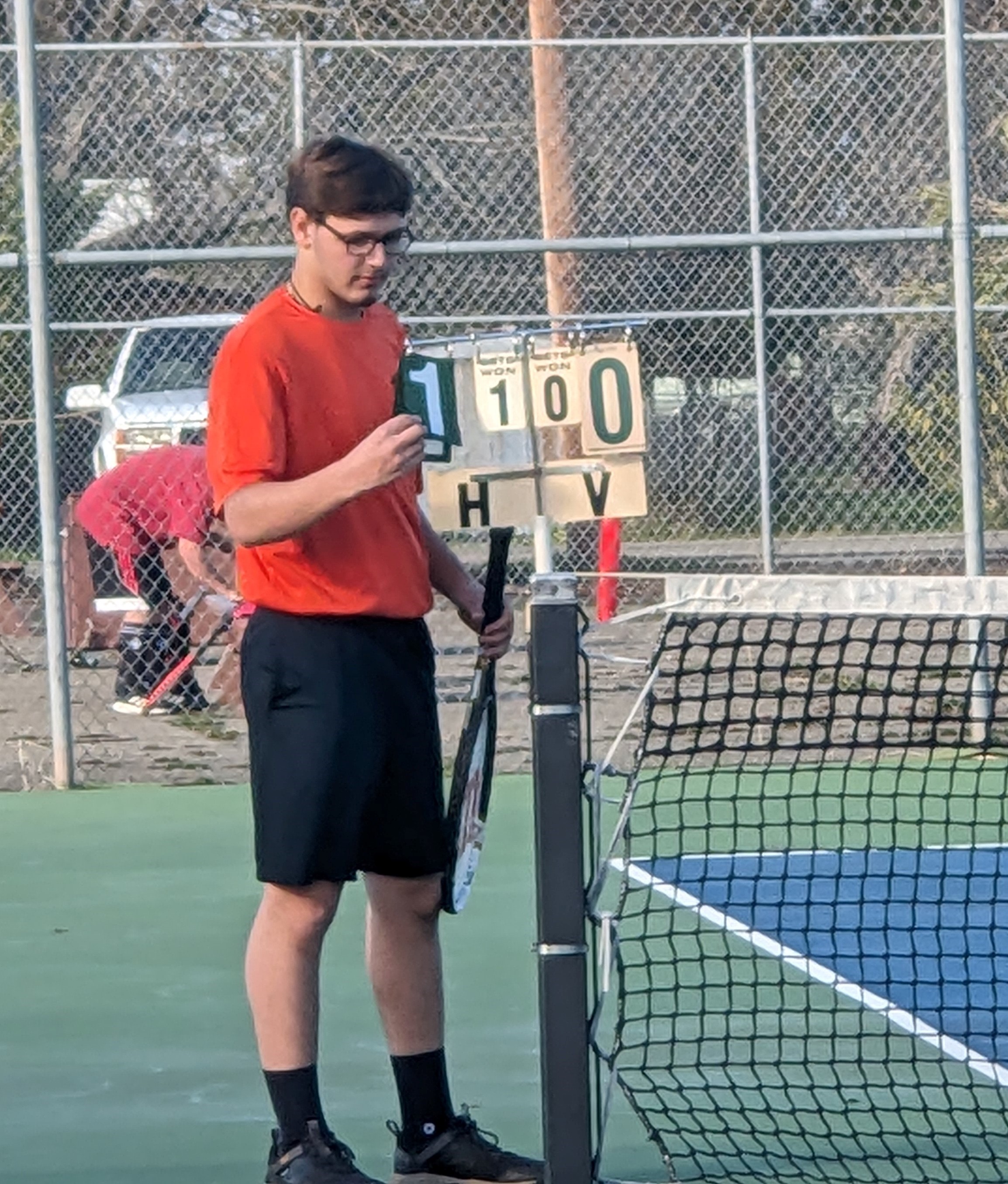 Kelseyville's Payton Morris updates the score during his third singles match with Cloverdale's Grace Kelder on Friday afternoon in Kelseyville. Morris prevailed 6-0, 6-2. (Courtesy photo)