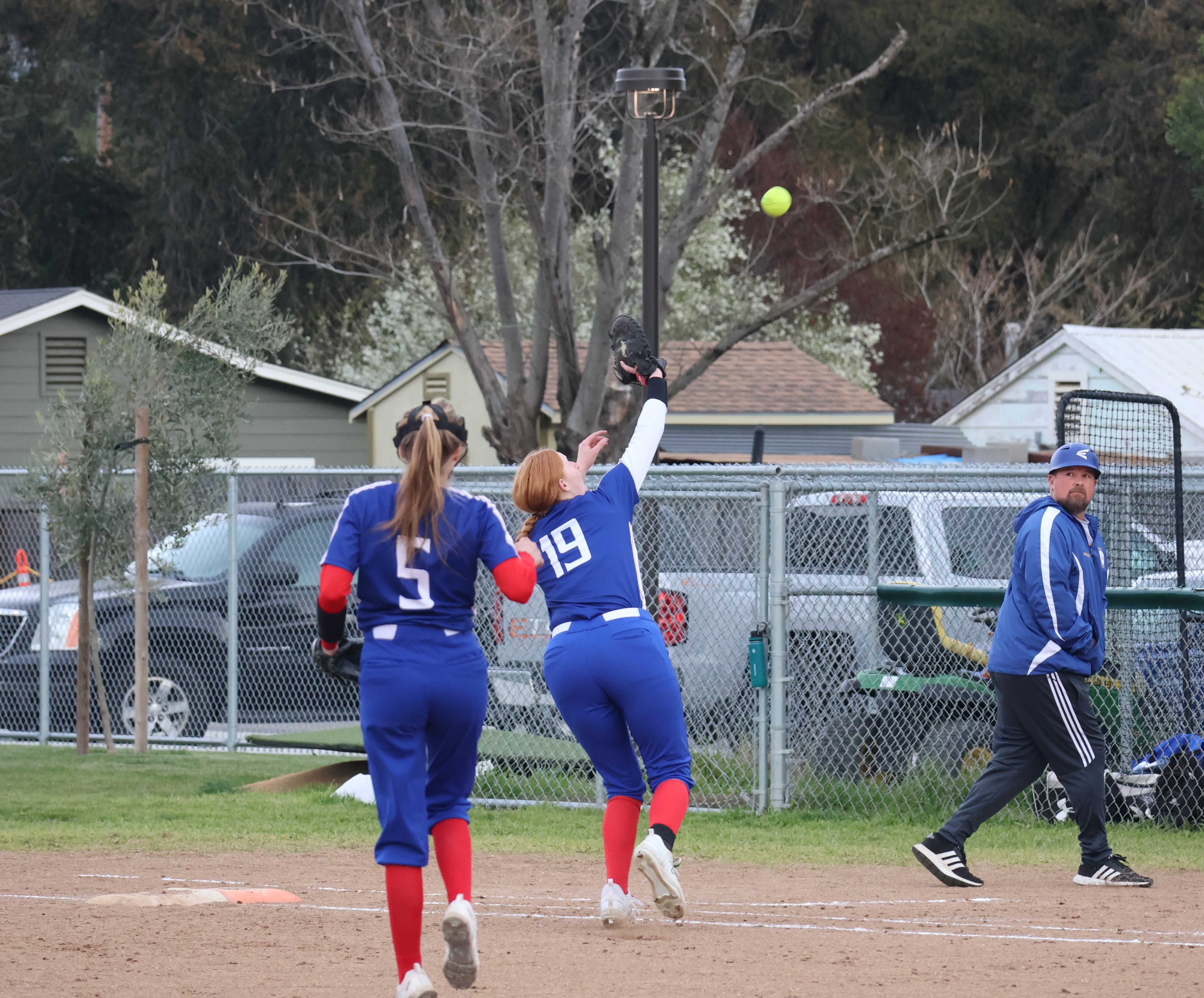 Lower Lake first baseman Rebecca Theodorou runs down a foul popup off the bat of Cloverdale'sTylie Hatcher in the bottom of the sixth inning. (Photos by Brian Sumpter)