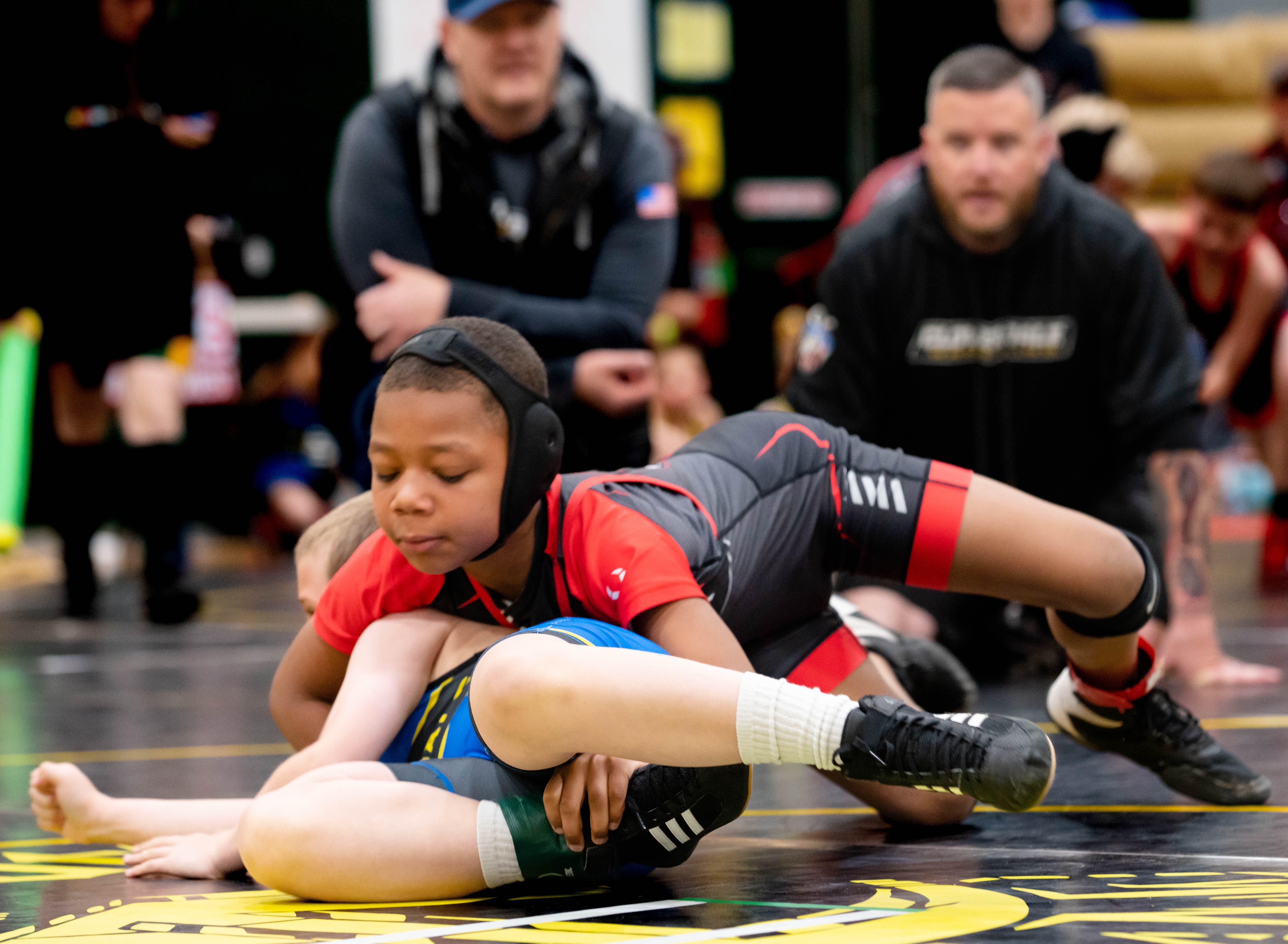 Kameron Colston secure the takedown during action Saturday in Willits. Colston topped the field in his division. (Courtesy photos)