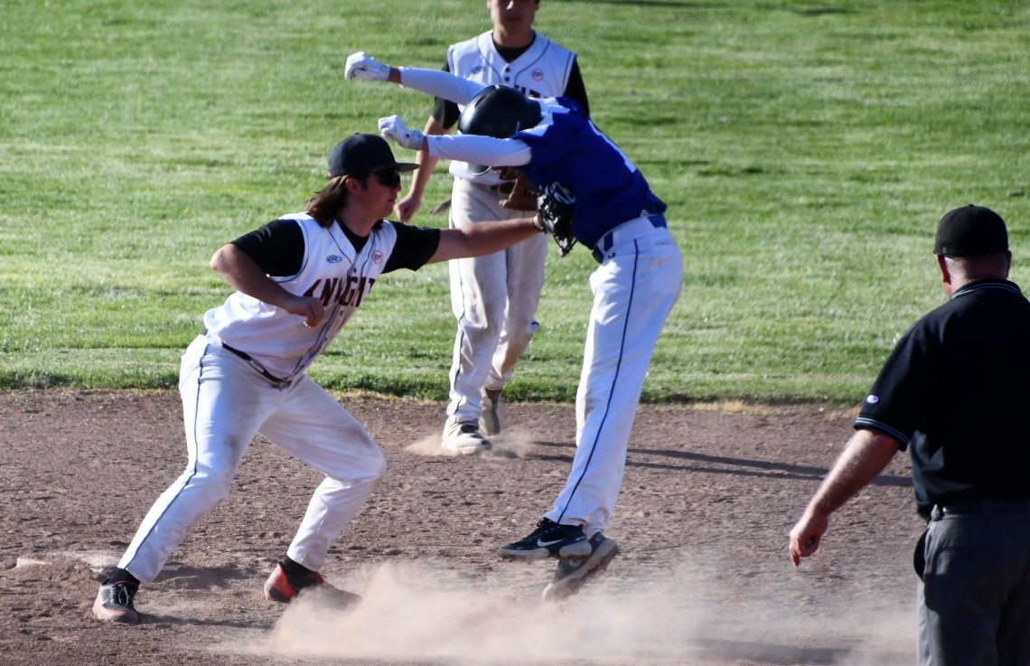 Kelseyville shortstop Zayne Barker tags out a Lower Lake runner at second base. (Photos courtesy of Marcy LeBoy)