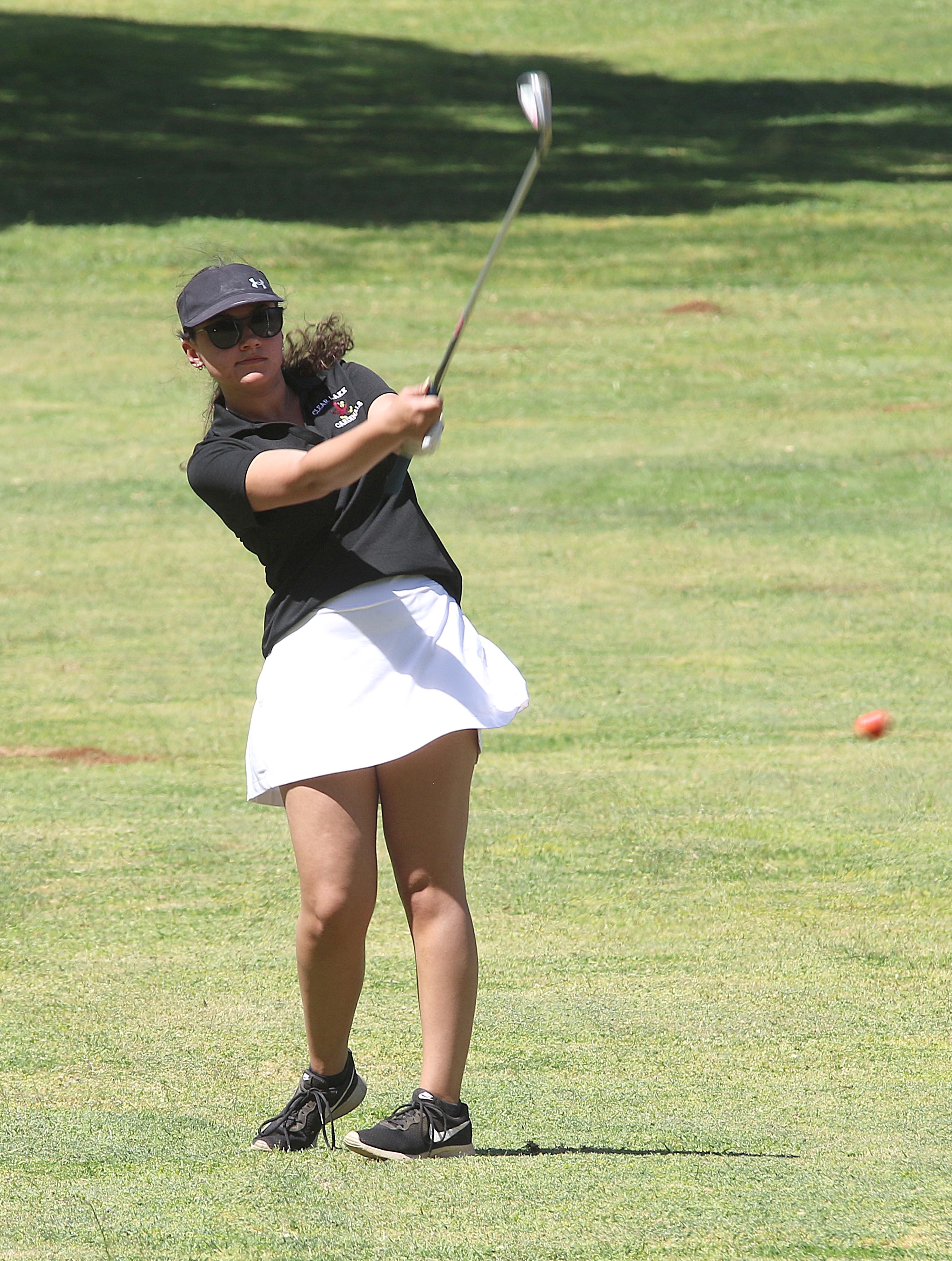 Brooke Hinchcliff follows the flight of her shot down the fairway during Clear Lake's home match Tuesday afternoon at Buckingham Golf and Country Club. Hinchcliff fired 102. (Photos by Minenna Photography)