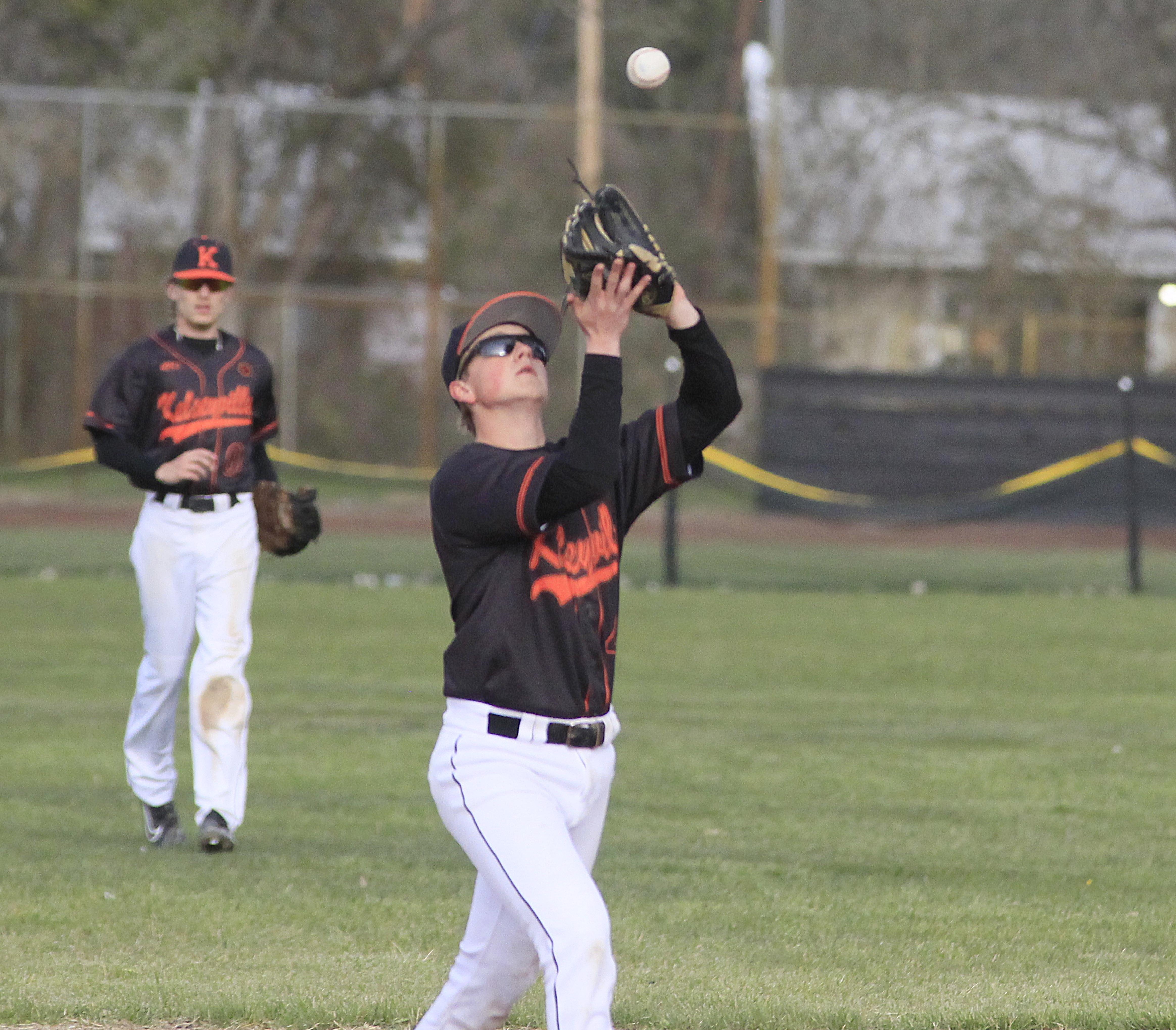 Jake Burke gloves a popup in Kelseyville's win over St. Helena. The Knights have won five straight. (Photos by Minenna Photography)