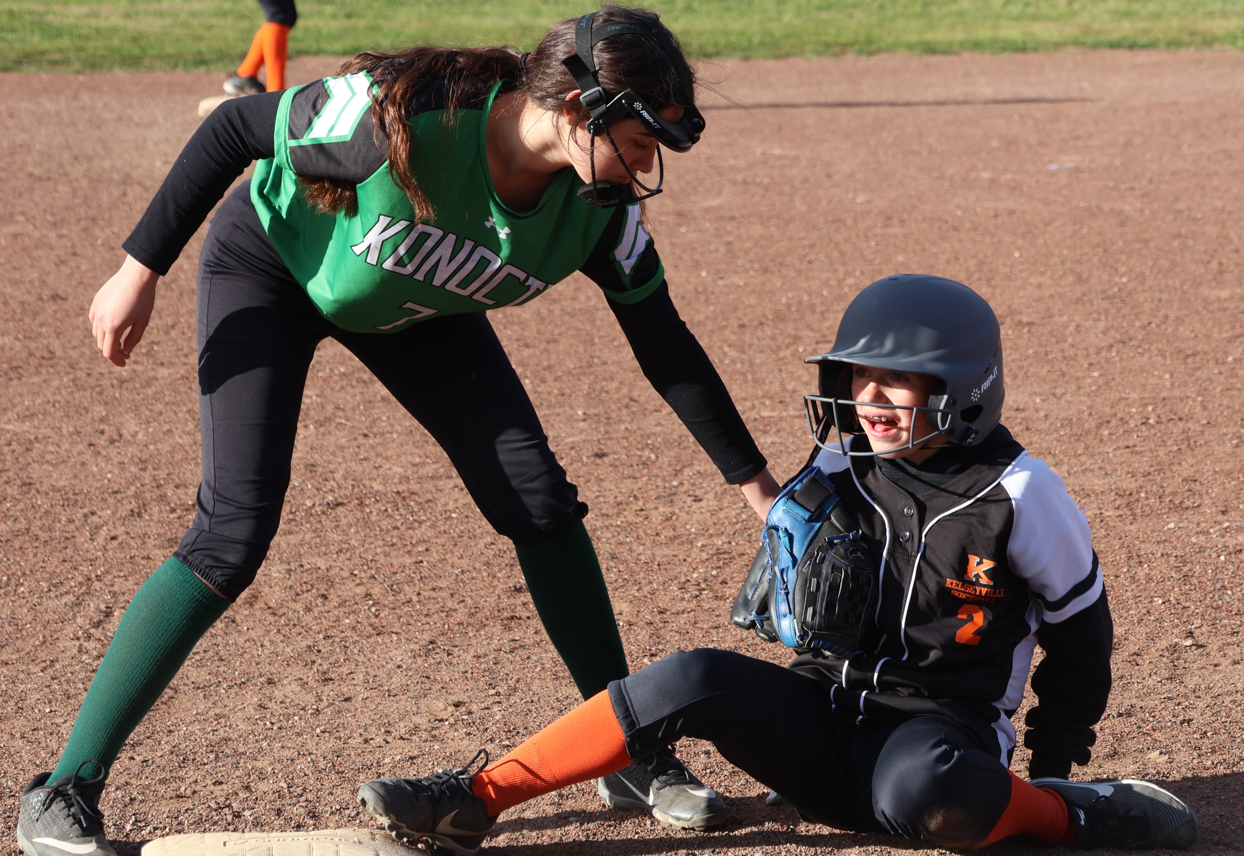 Konocti third baseman Heidi Ortega tags out a Mountain Vista player who wandered too far off the bag. (Photos by Brian Sumpter)