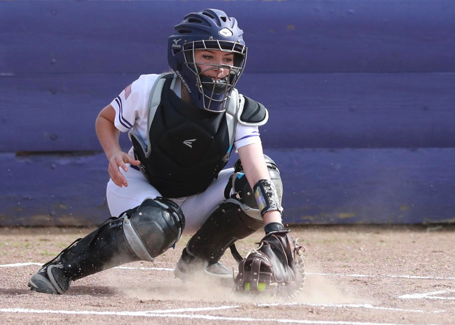 Middletown catcher Carina Fleenor gloves a ball in the dirt during the Mustangs' 8-6 win over Clear Lake. (Photos courtesy of Megan Buckley Cutting)