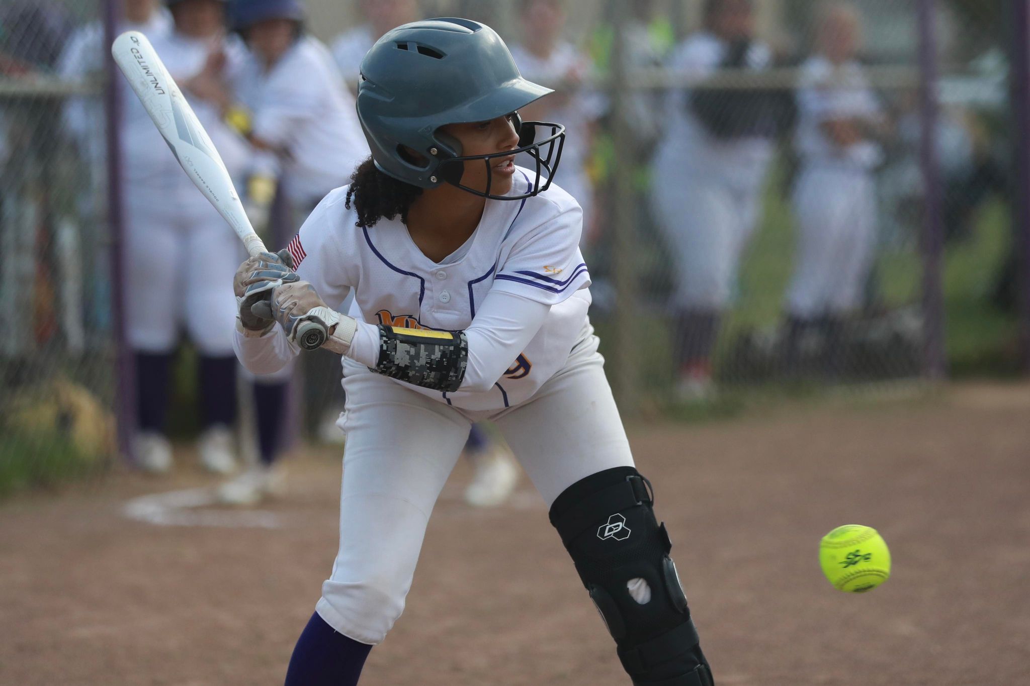 Middletown's Jaidyn Brown looks over a pitch during the Mustangs' 12-7 loss to Kelseyville. Brown went 2-for-2. (Photo courtesy of Megan Buckley Cutting)