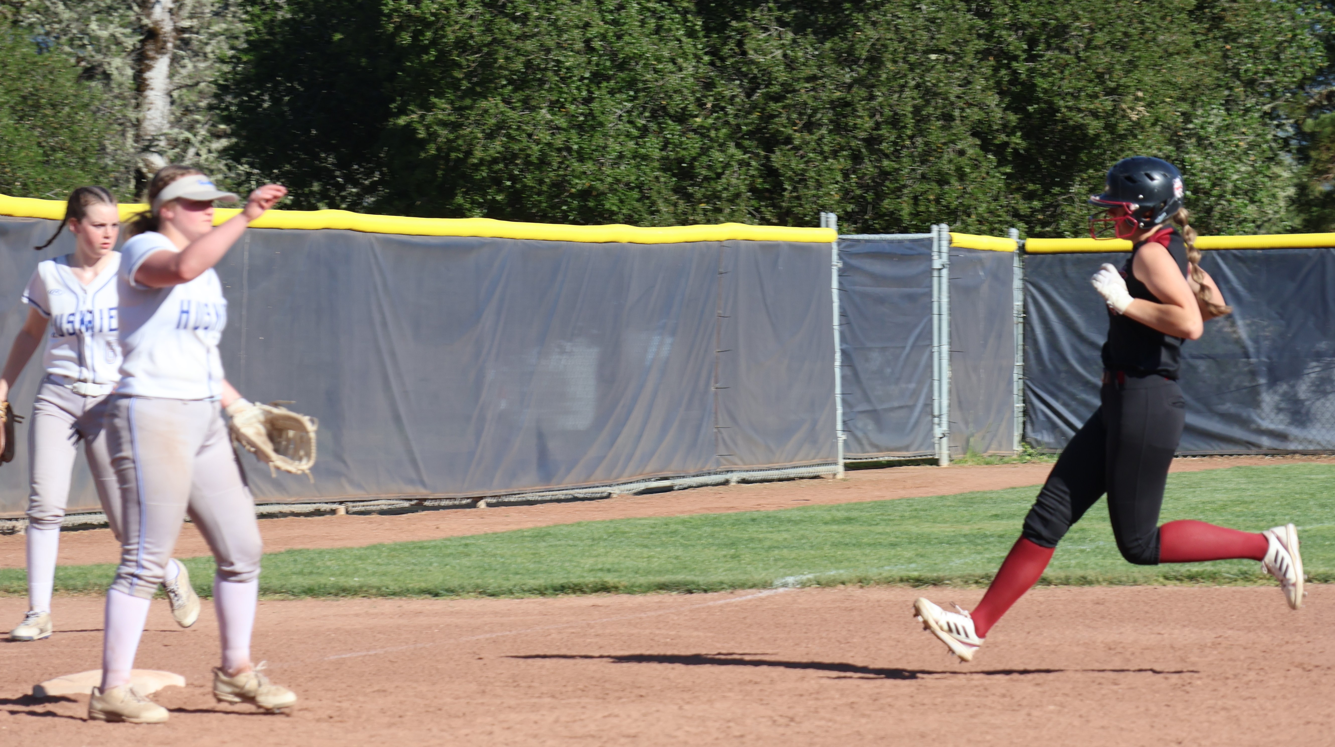 Montana Wells pulls into third base with a standup triple in the bottom of the sixth inning. She scored two batters later on teammate Stella Hill's bloop single into center field to give Clear Lake a 2-0 lead. (Photos by Brian Sumpter)