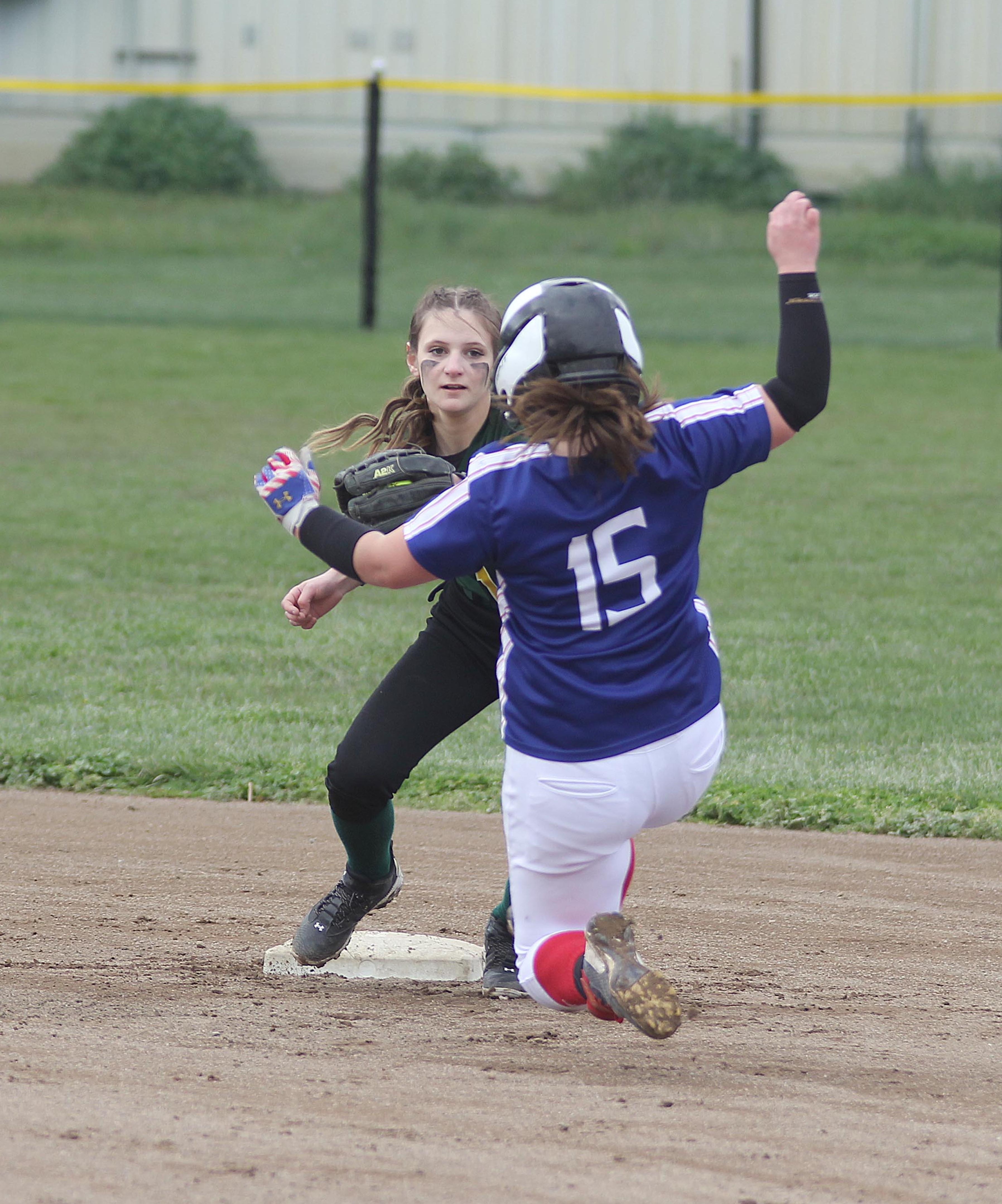 Lower Lake's Shaye Tubbs slides into second base during the Trojans' 9-8 league win over the Willits Wolverines on Friday afternoon in Lower Lake. (Photos by Minenna Photography)