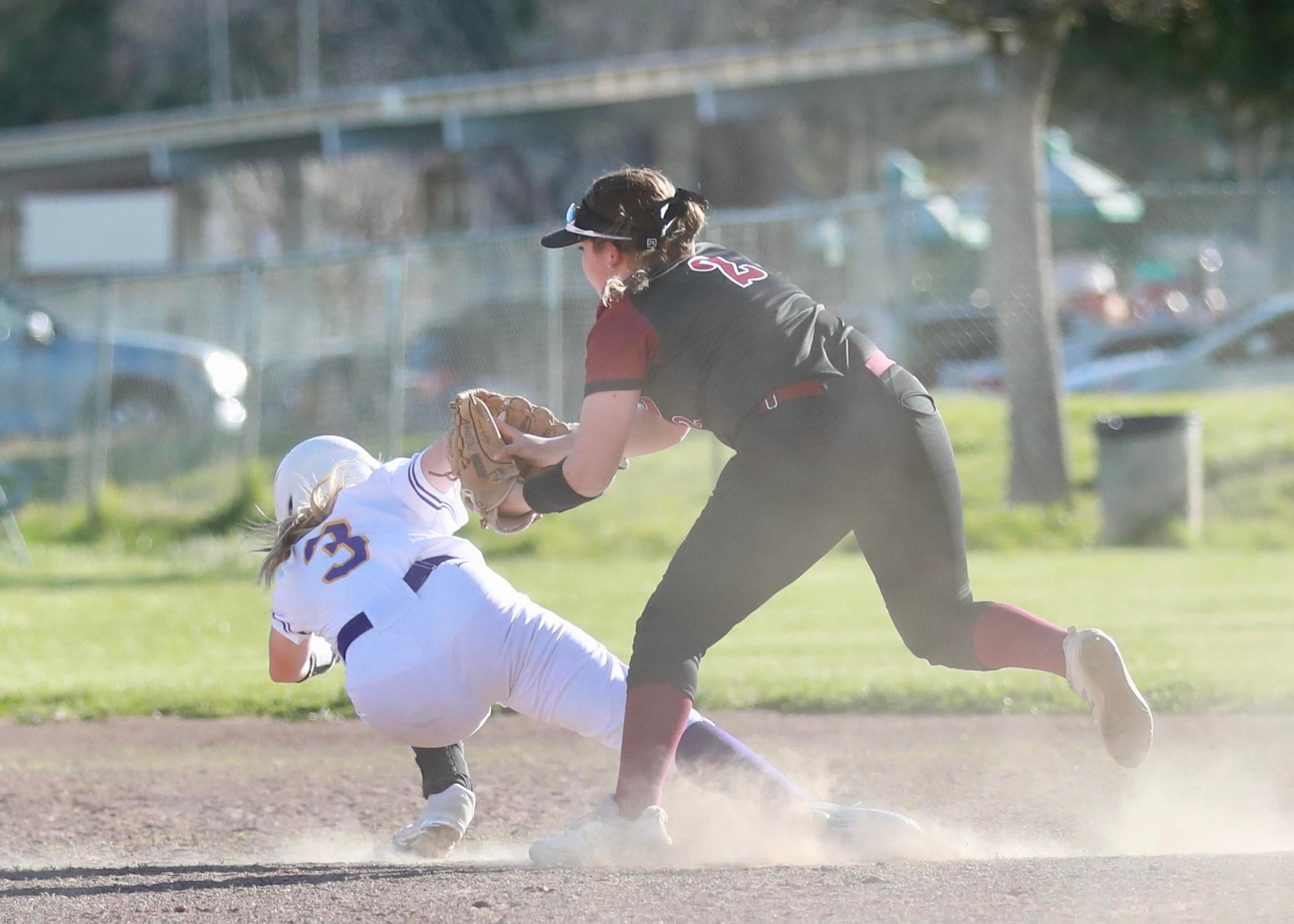 Middletown's Jaylee Doris (3) is tagged out by Clear Lake second baseman Grace Gomez after getting hung up between second and third base in the bottom of the sixth inning. (Photos courtesy of Megan Buckley Cutting)