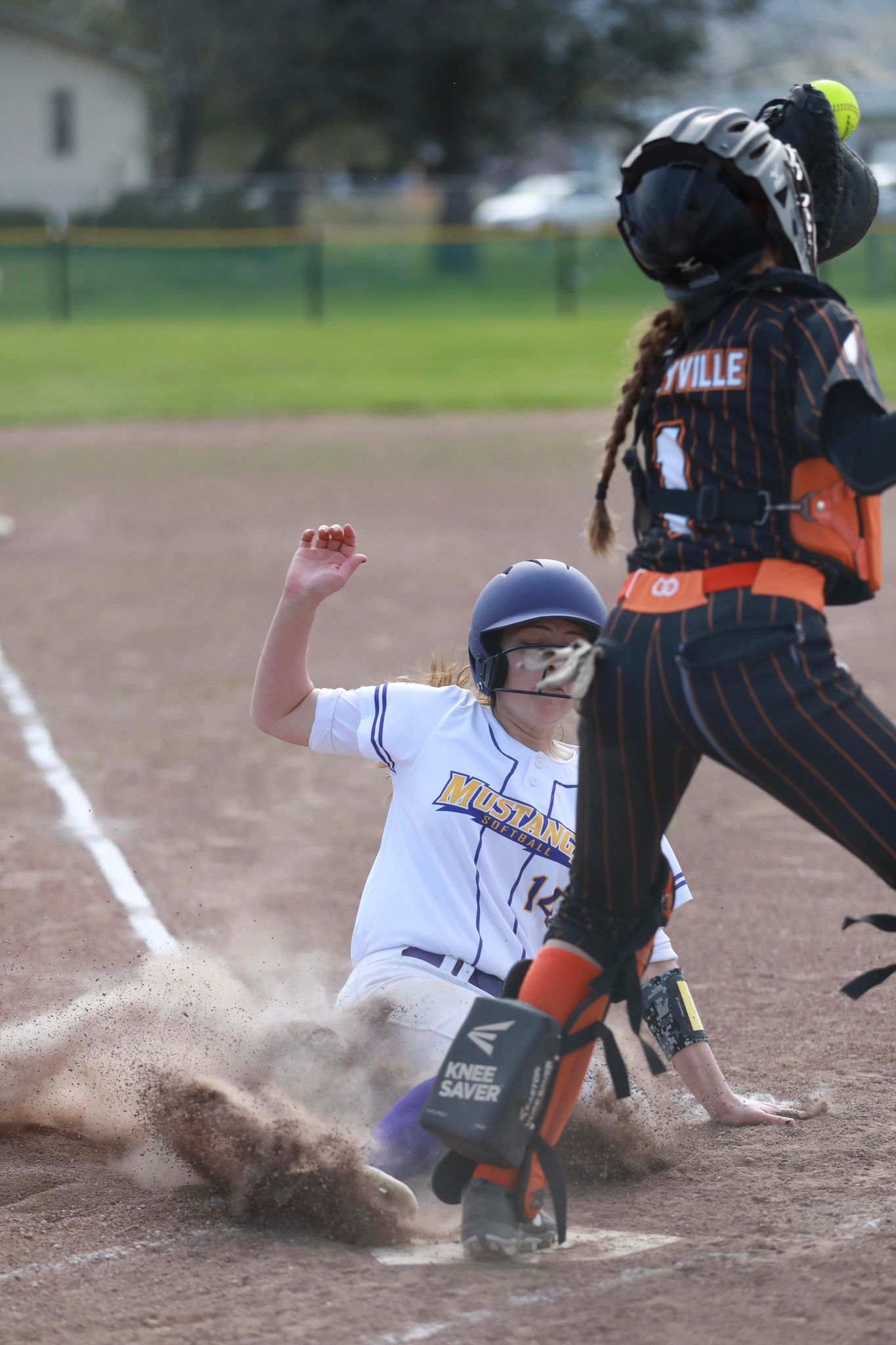 Middletown's Cadence Henry slides in ahead of the tag Tuesday afternoon in Middletown. Henry went 2-for-4 with a triple and a RBI in a 12-7 league loss to the visiting Kelseyville Knights, who won their third straight game. (Photo courtesy of Megan Buckley Cutting)