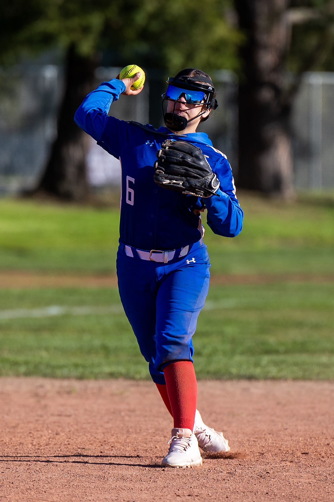 Lower Lake's Marriah Perez makes the throw from third base. (Photos courtesy of Michael Lucid)