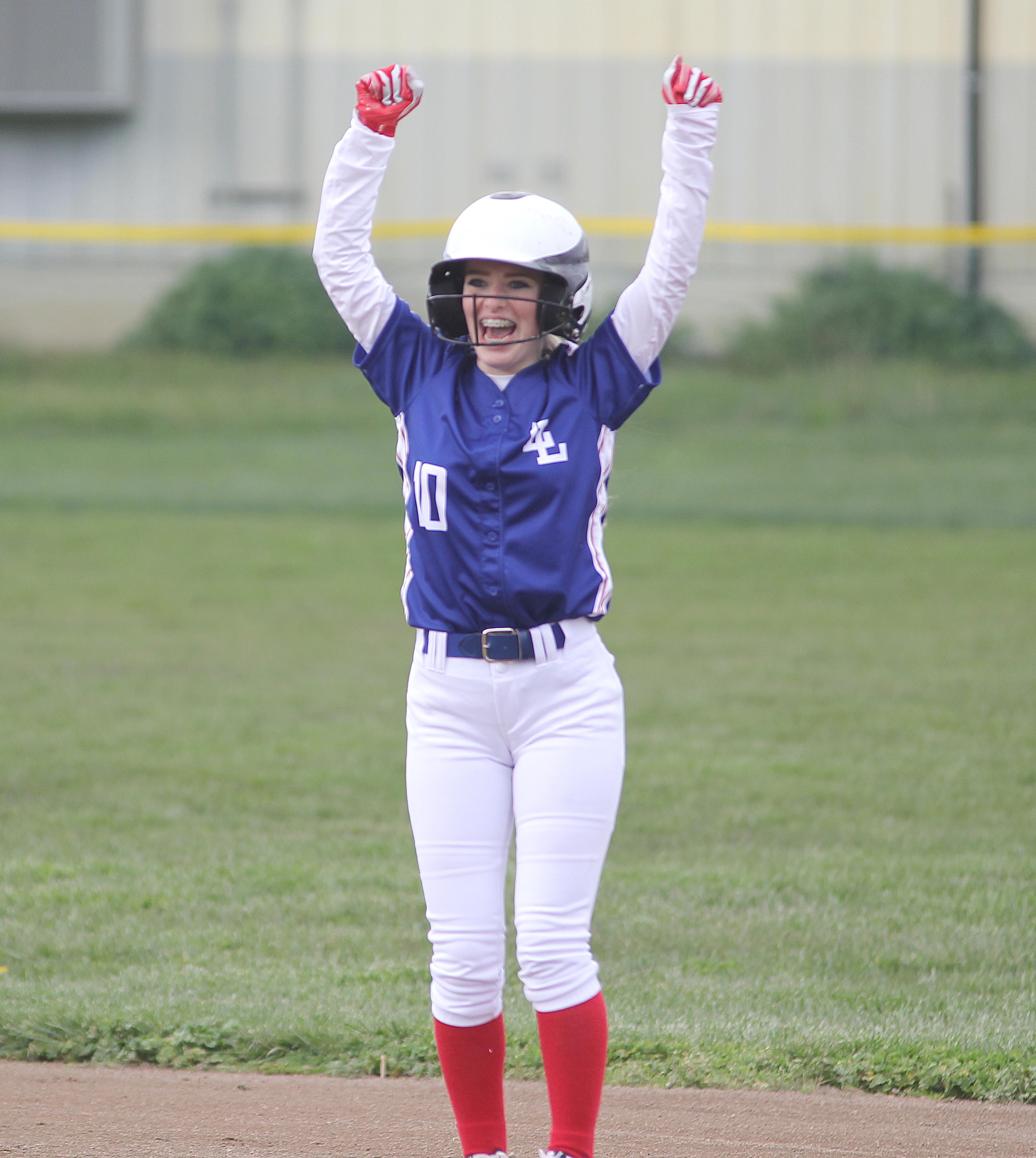Lower Lake's Kaitlyn Klein celebrates at second base after doubling against Willits. (Photos by Minenna Photography)