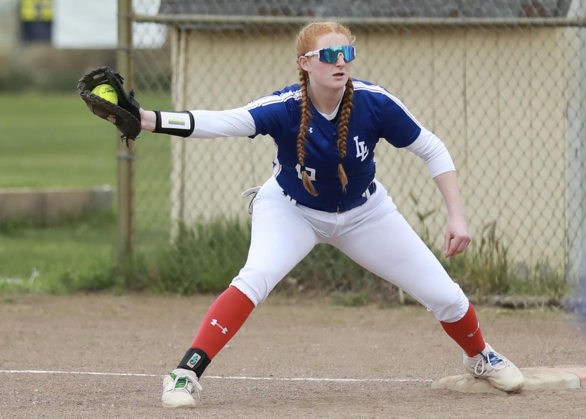 Lower Lake first baseman Rebecca Theodorou gloves the ball for an out against Middletown. (Photos by Megan Buckley Cutting)